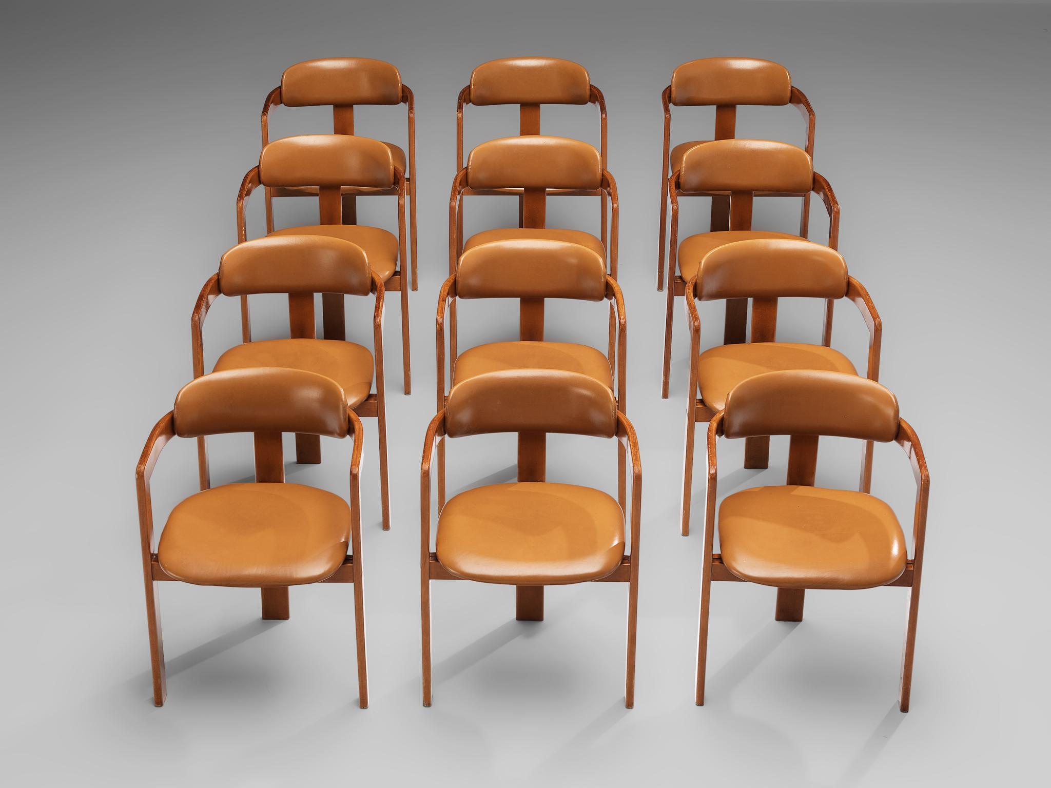 Set of 14 dining chairs, wood, leatherette, Italy, 1970s

This set of Italian dining chairs has a strong resemblance to Augusto Savinis 'Pamplona' chair (1965) and Afra & Tobia Scrapas 'Pigreco' chair (1959/60) yet the designs are different in their