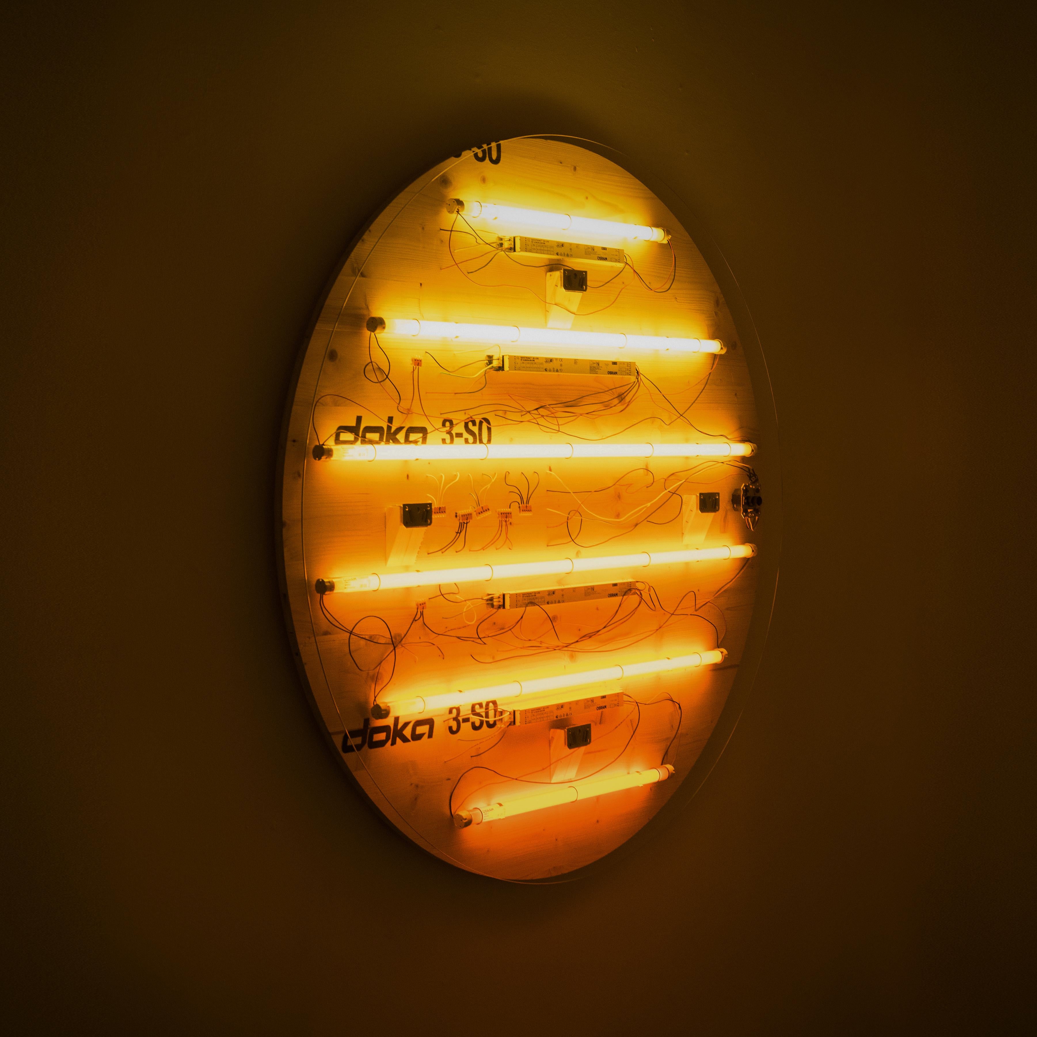 Private sunset wall lamp is presented by Galerija VARTAI

Personal Sunset is a limited edition wall lamp designed by Martynas Kazimierenas. Made from fluorescent lamps, doka 3-SO boards, tampered glass and potentiometer, this unique design piece