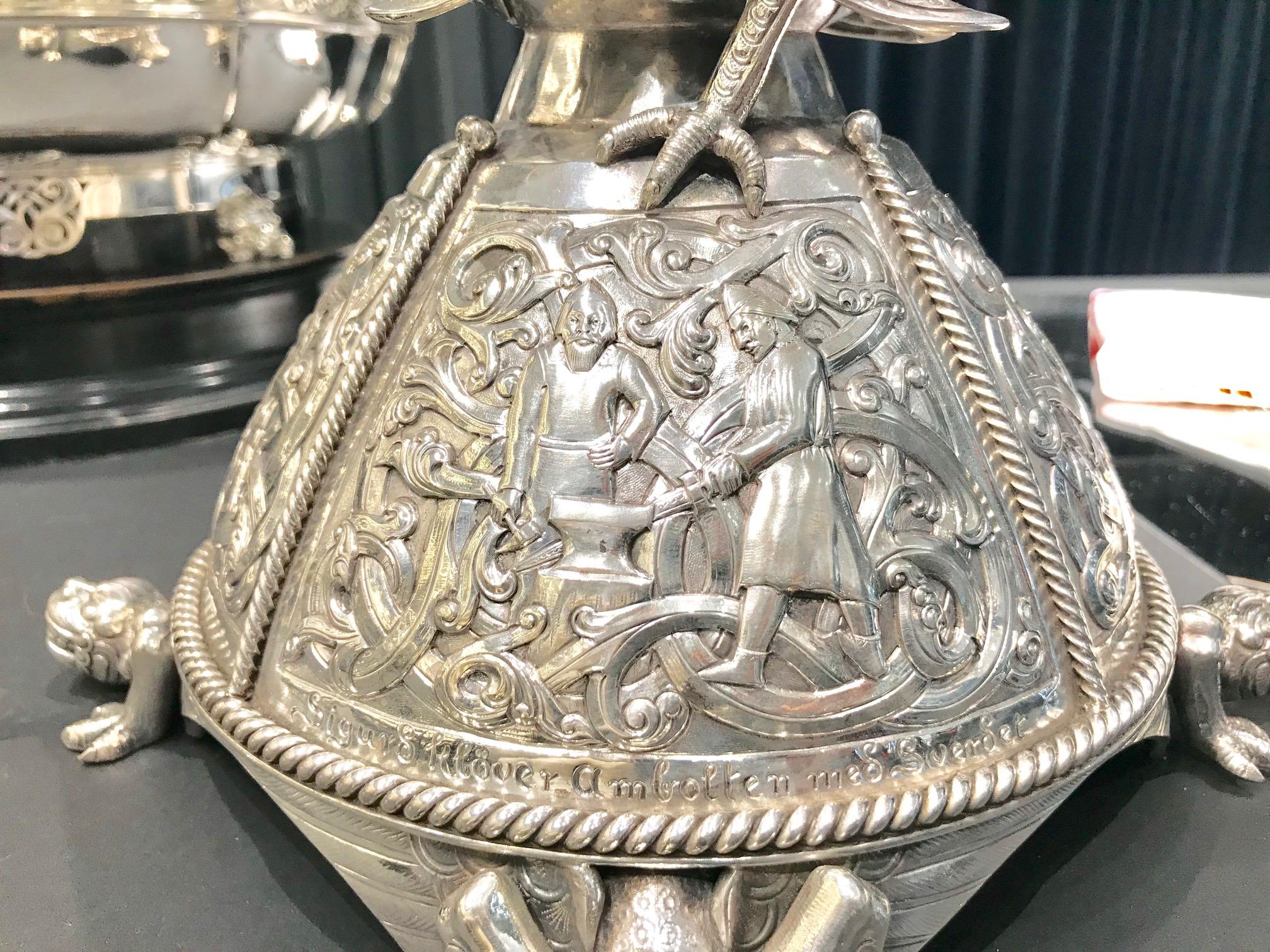 This is a truly unique collection of Norwegian silver from a private estate in Florida. This set includes a large 830 silver centerpiece by Oslo silversmith N. M. Thune and six large silver candlesticks by Trondheim silversmith Henrik Moller. Both