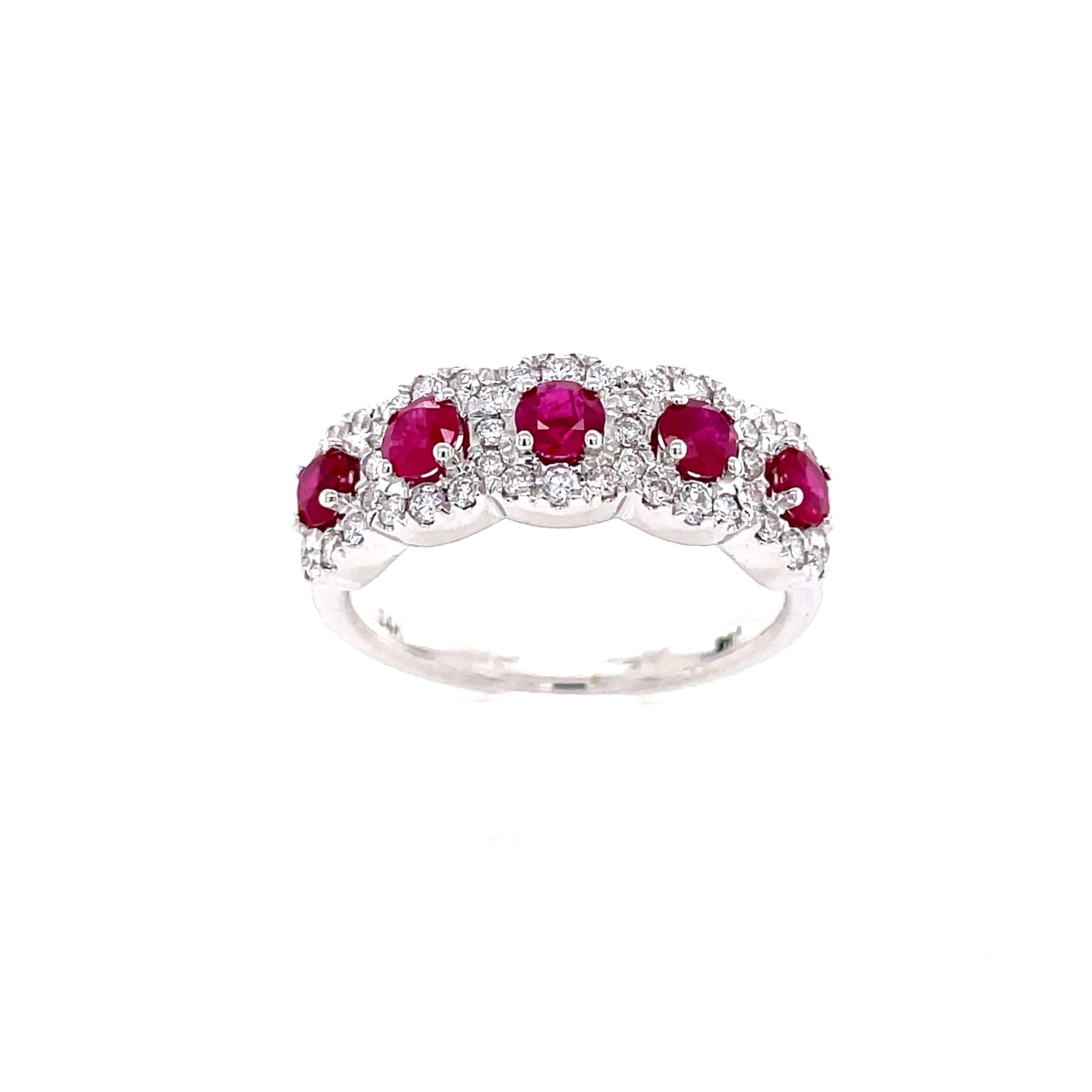 A stunning cocktail ring crafted in 14 karat white gold with 5 round natural ruby stones, (0.15 carats each) weighing a total of 0.75 carats. The measurements for these stones are 3.00 – 3.20mm. This ring also contains 48 natural round brilliant