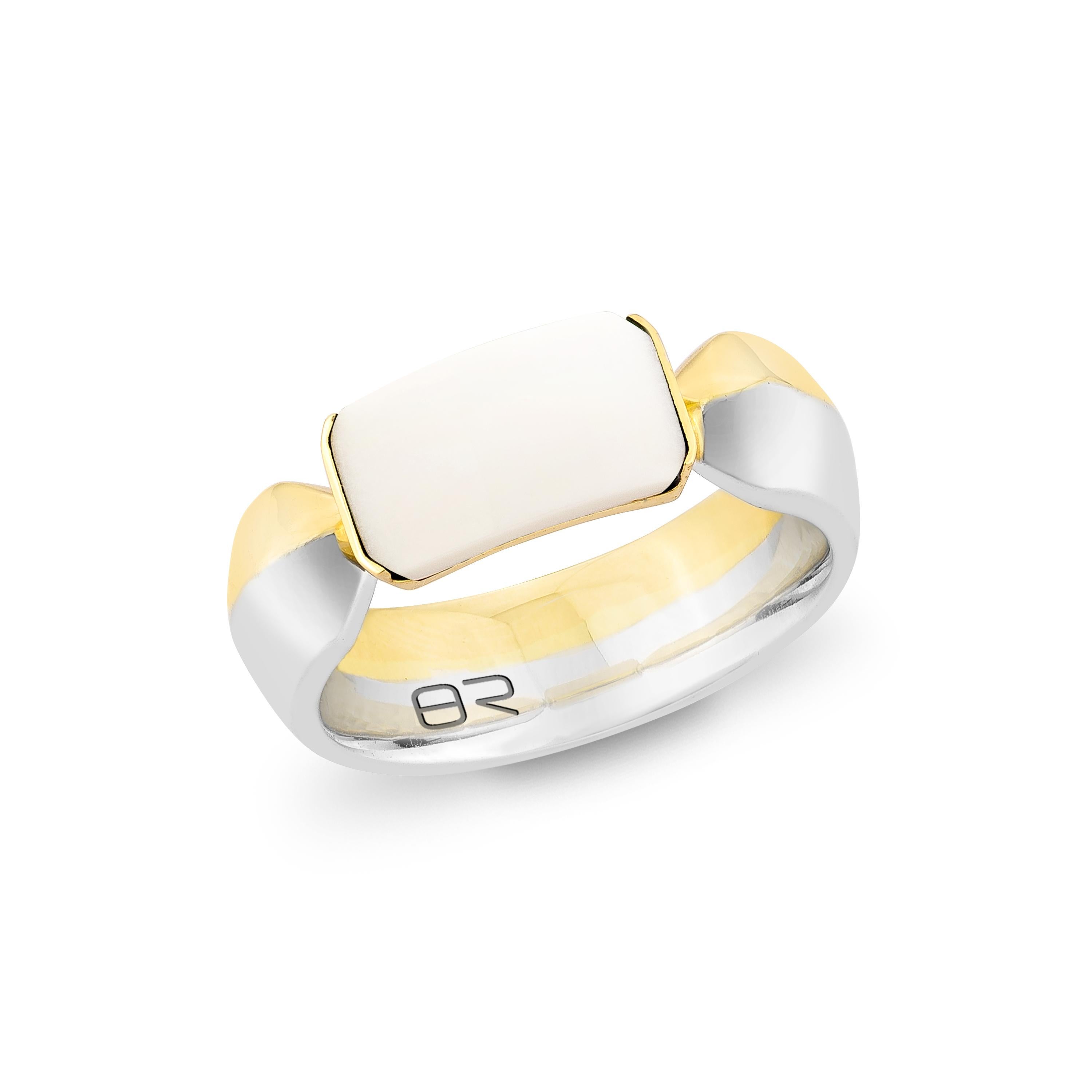 A sophisticated blend of elegance and modern charm, this ring features a luminous white agate set in a striking 18K white and yellow gold design. Perfect for everyday wear or special occasions, it adds timeless elegance to any ensemble.

White Agate