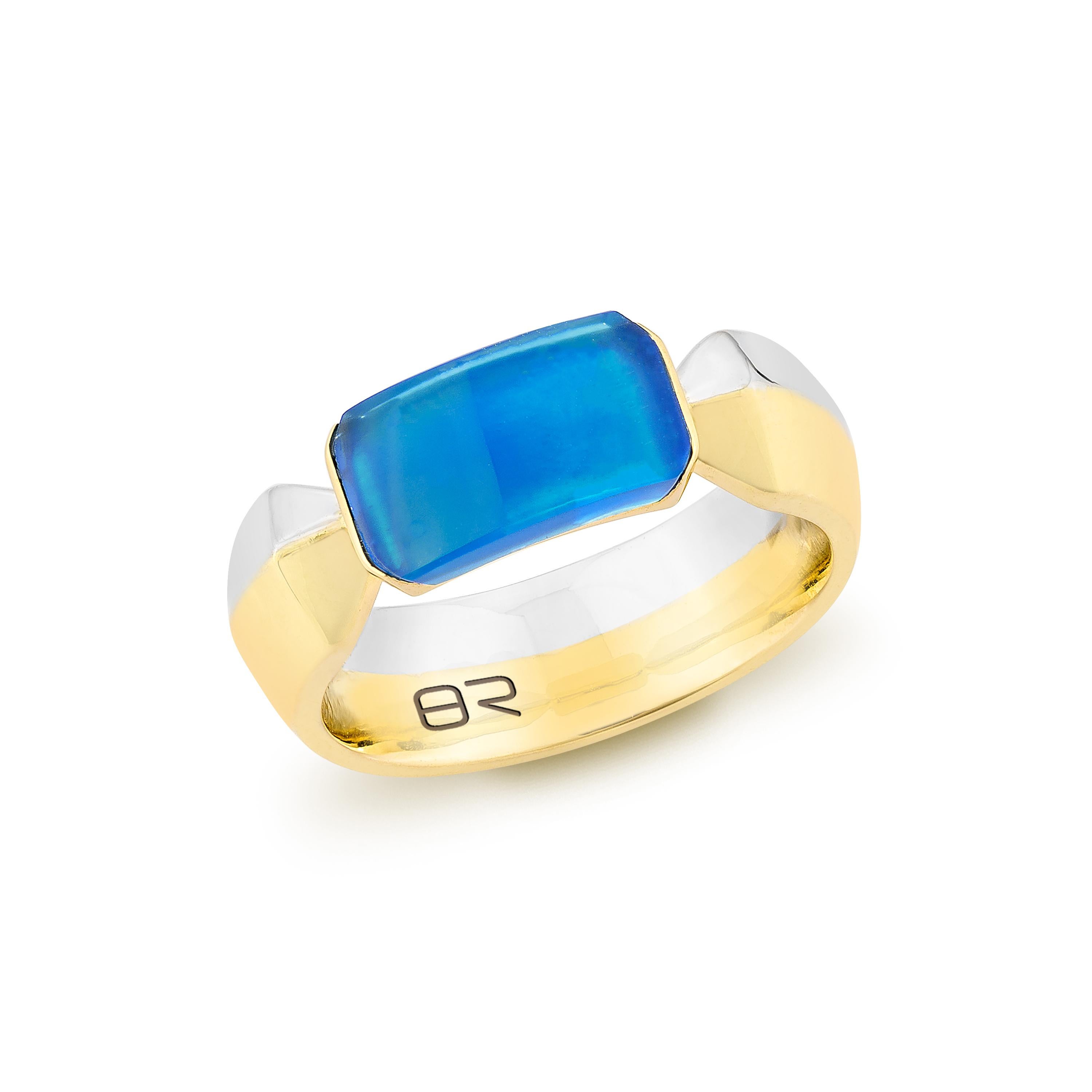 This exquisite Blue Agate Fancy Ring in 18K White yellow gold showcases the stone's serene hues in a sleek, modern design. A perfect blend of elegance and bold style.

Blue Agate Fancy Ring in 18Karat White Yellow Gold.

Blue Agate: 1.63 carat, free