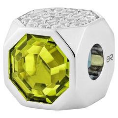 Priyashi Nahata Peridoto e Topazio Blu 1,82ct. Ciondolo con zaffiro in 18KWG.