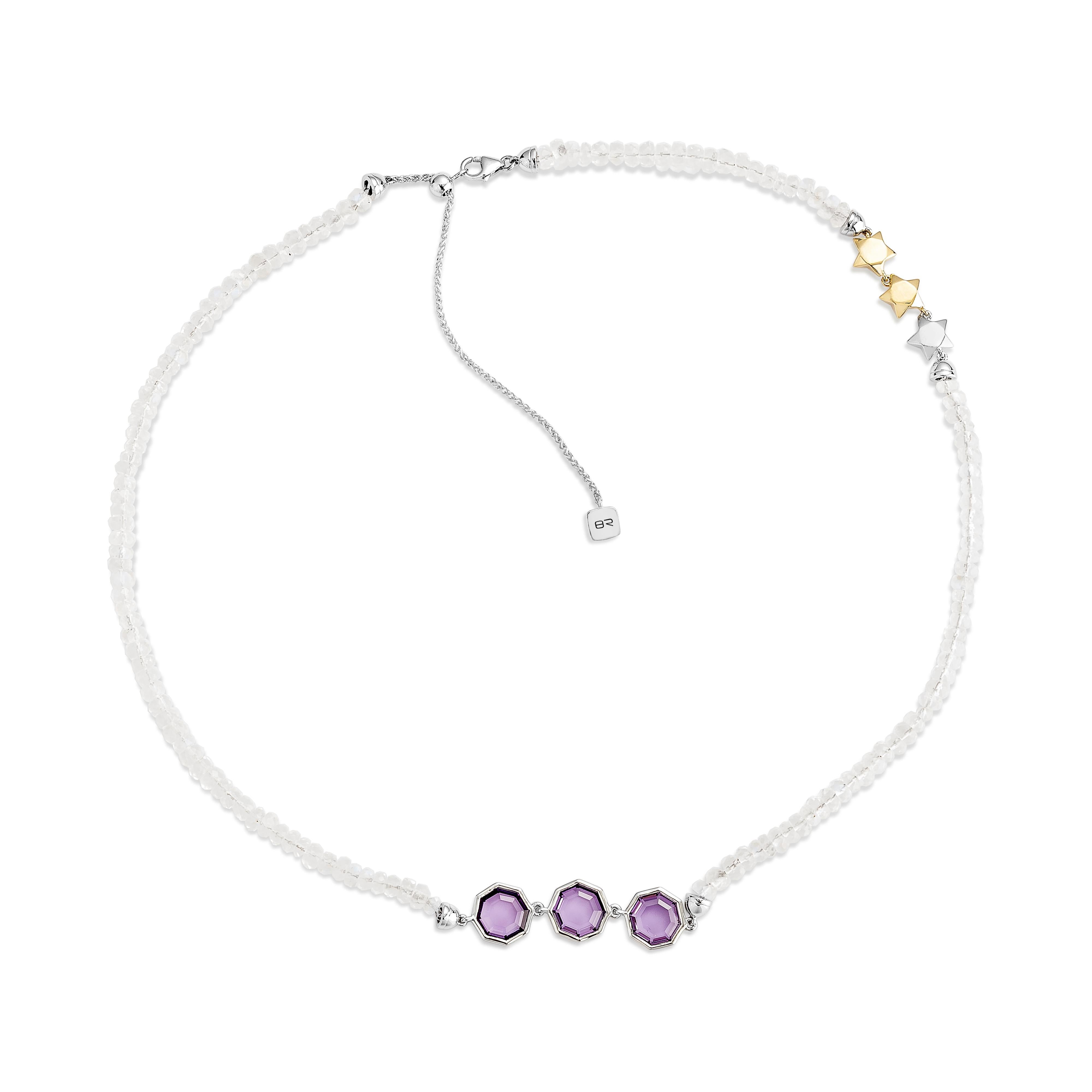 Radiant and enchanting, this Amethyst & Rainbow Moonstone Necklace in 18K Yellow Gold combines vibrant purple hues with iridescent shimmer, creating a captivating blend of elegance and charm.

Amethyst & Rainbow Moonstone Necklace in 18Karat Yellow