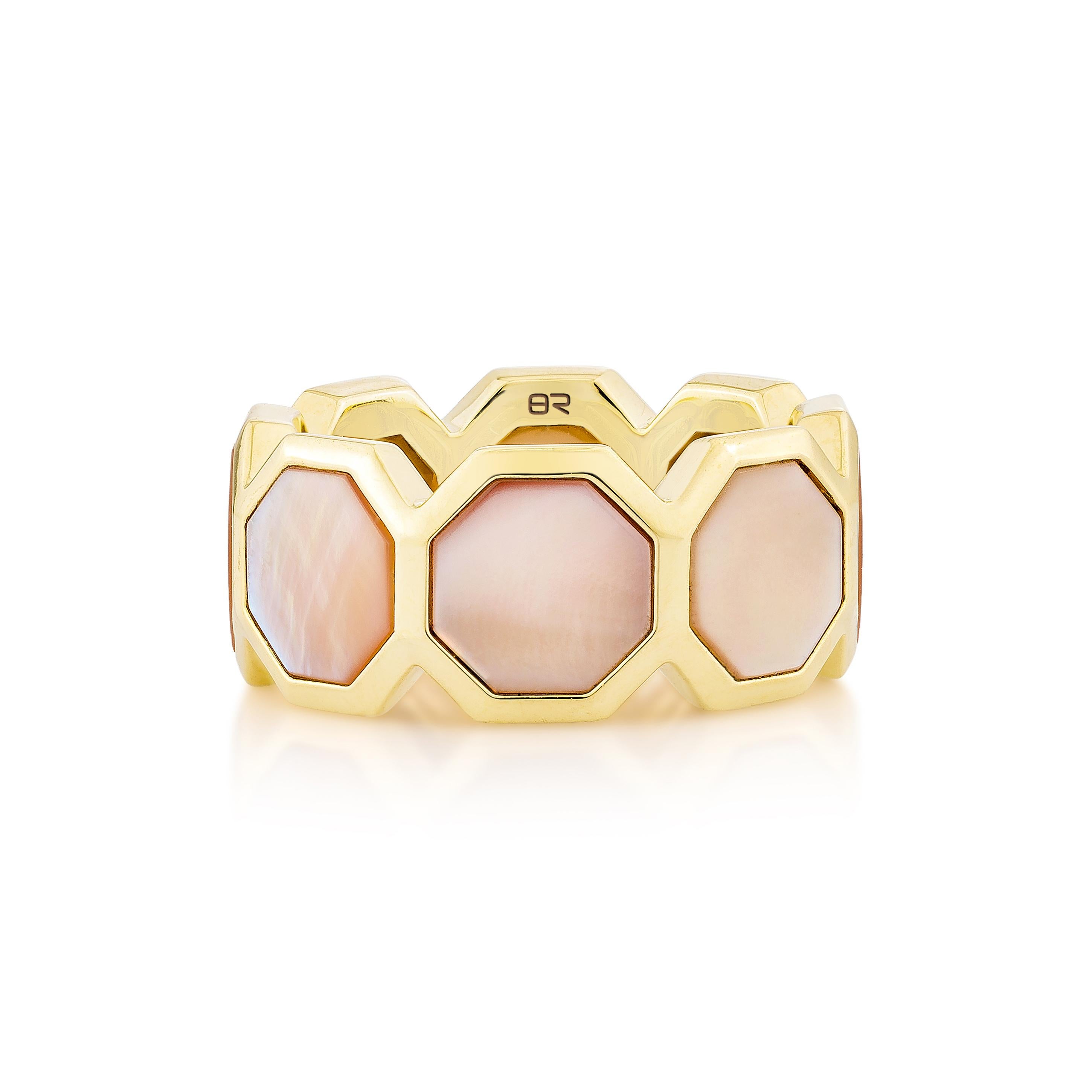 Elegantly crafted in 18K Yellow gold, this fancy ring features a stunning pink mother of pearl centerpiece. Its sophisticated design and luminous sheen make it a timeless statement piece for any collection.

Pink Mother of Pearl Fancy Ring in