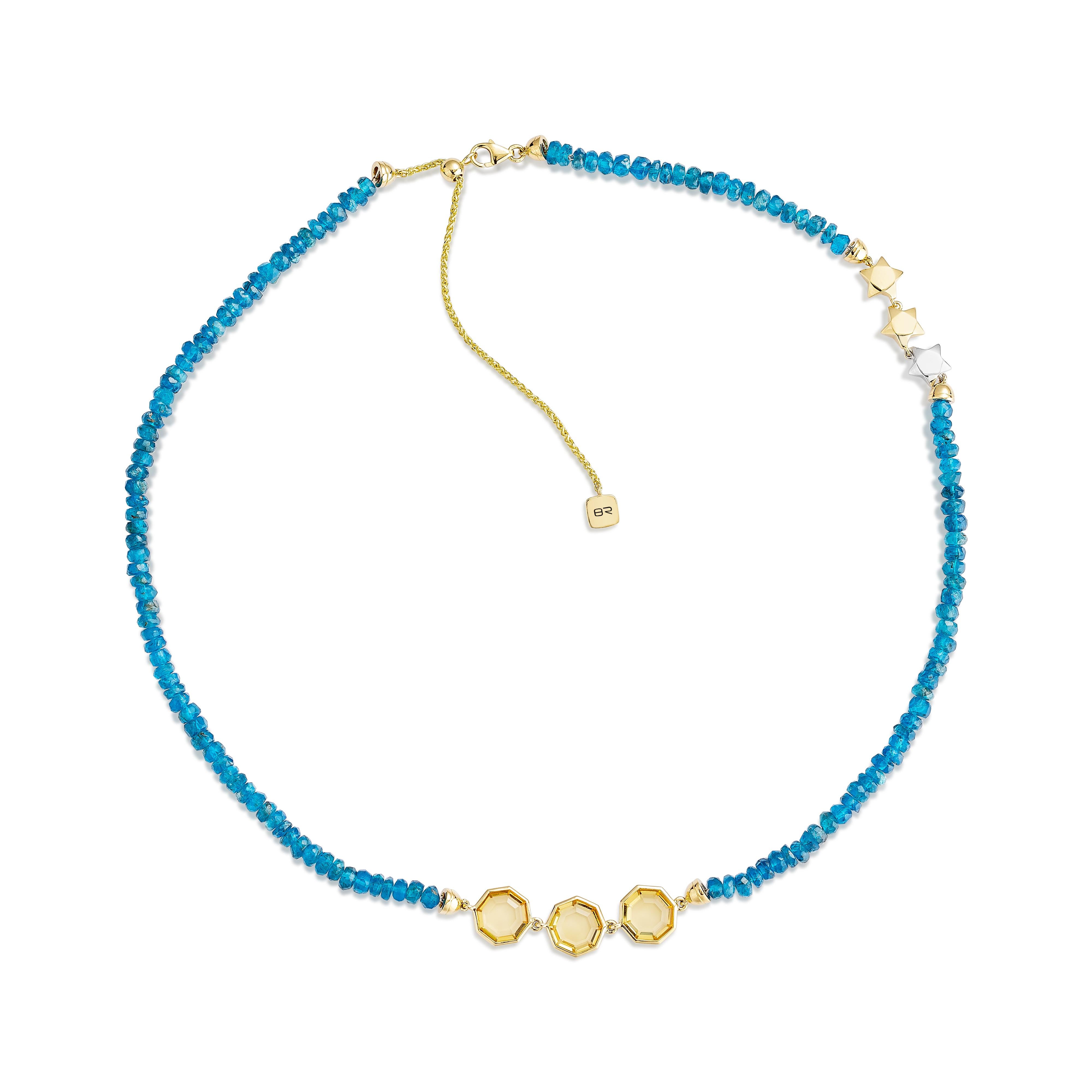 Le collier de citrine et d'apatite néon en or jaune 18 carats est une pièce vibrante qui rayonne d'énergie et d'élégance. Le collier, dont la pièce maîtresse est une superbe citrine, est rehaussé d'apatite néon, créant ainsi un contraste saisissant