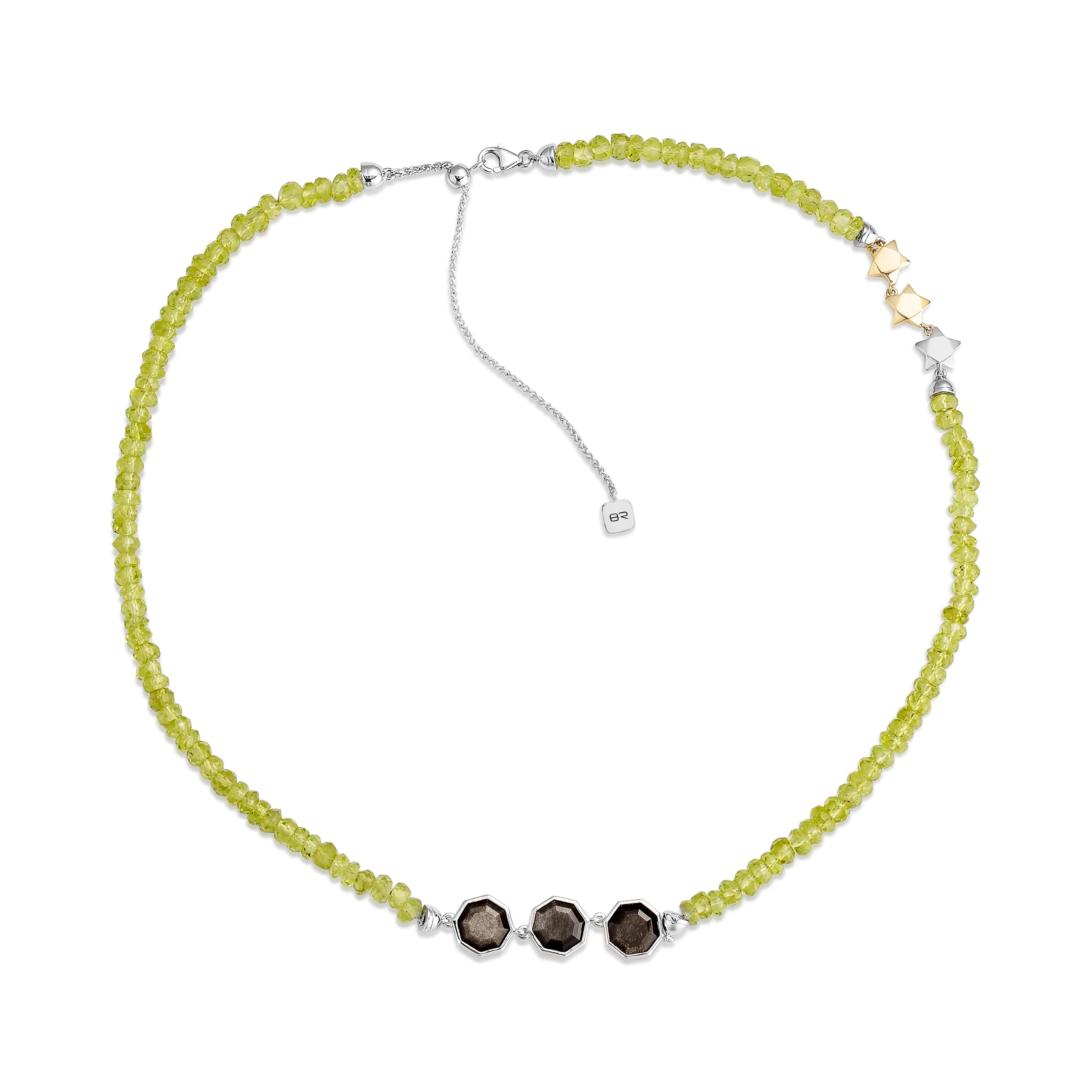 The London Blue Topaz & Amethyst Necklace in 18K White Gold is a masterpiece of elegance and color harmony. Featuring a mesmerizing London blue topaz as its centerpiece, the deep, moody blue is beautifully accented by the rich violet hues of