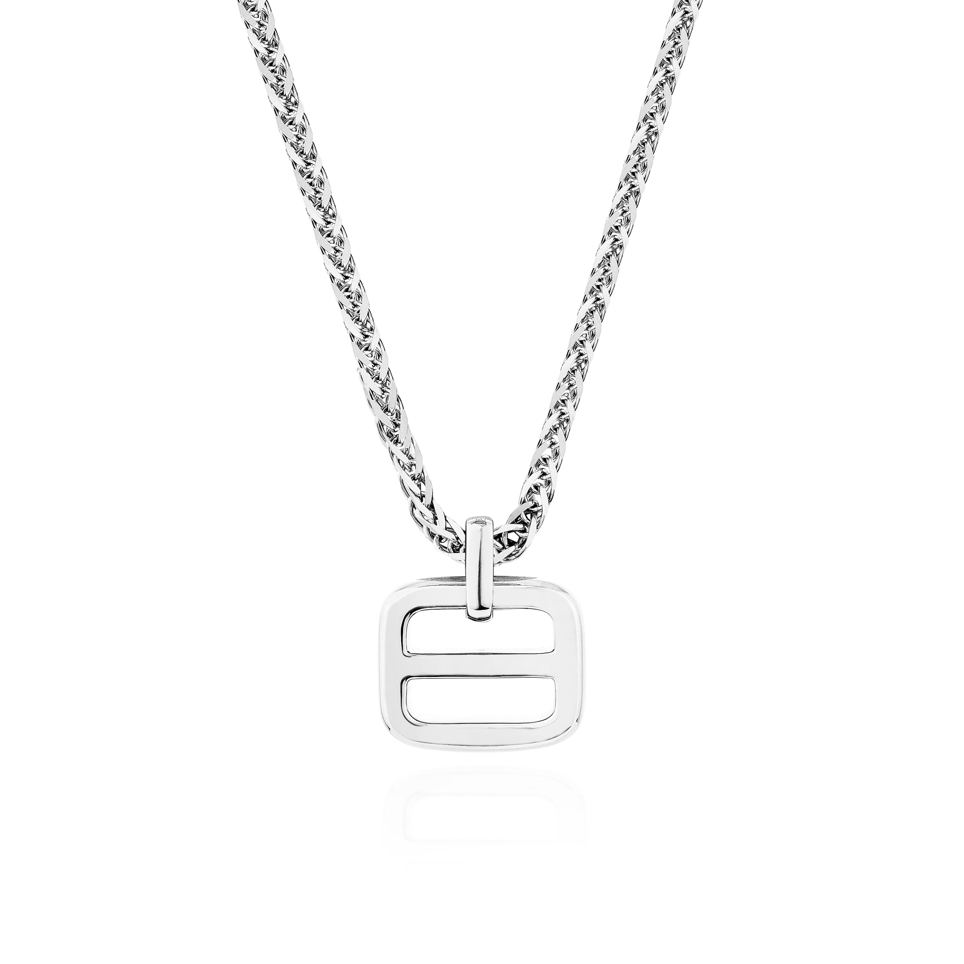 Eleva il tuo stile con questo ciondolo classico, squisitamente realizzato in platino. Caratterizzato da un design senza tempo, la sua estetica elegante e raffinata lo rende un accessorio versatile per ogni occasione. Perfetto come pezzo a sé stante