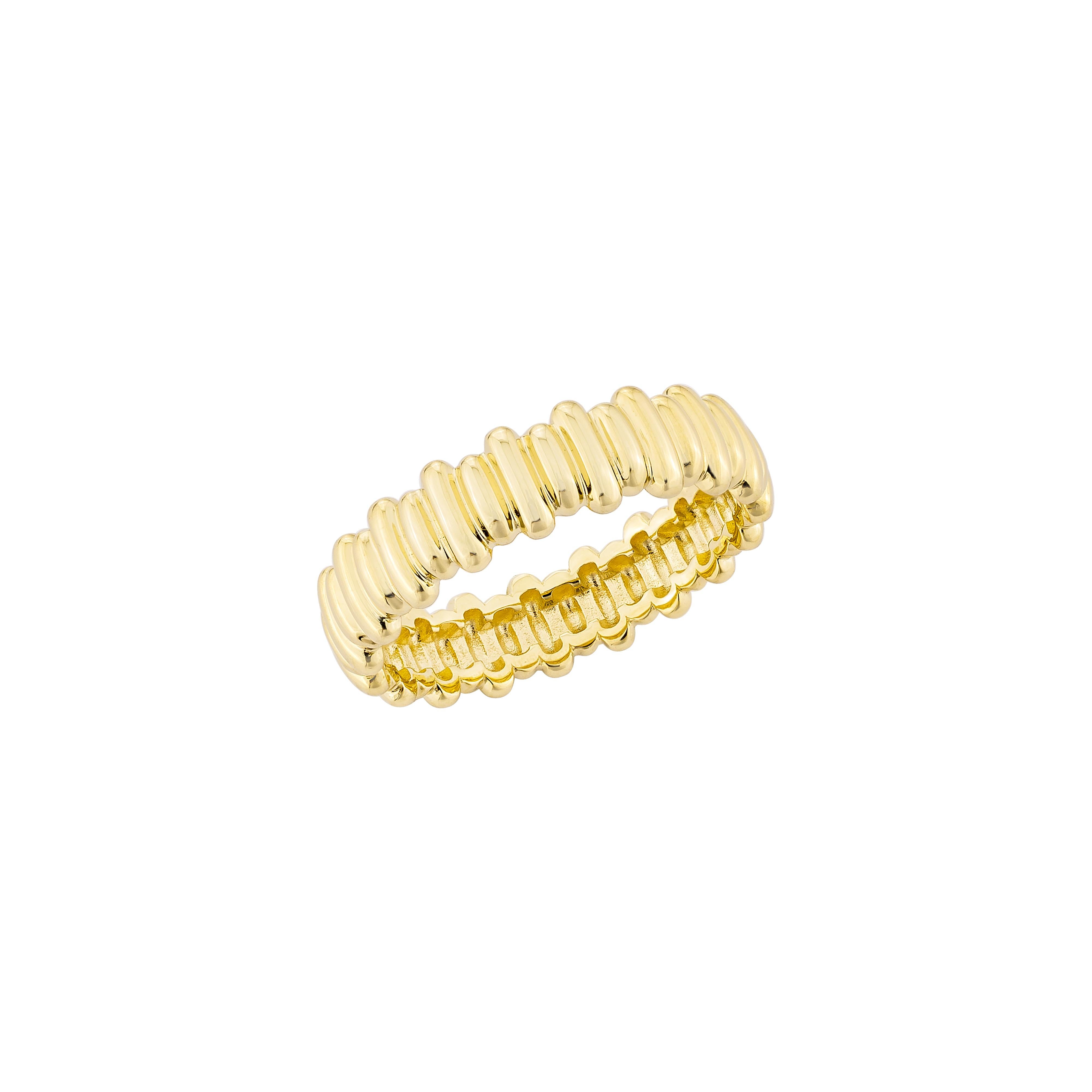 Un bracelet d'éternité moderne en or jaune 18 carats présentant un motif nervuré continu qui ajoute de la texture et de la brillance. Parfaites pour être empilées ou pour être portées seules.

Or : 3,40 g, or jaune 18 carats. 
R1987





