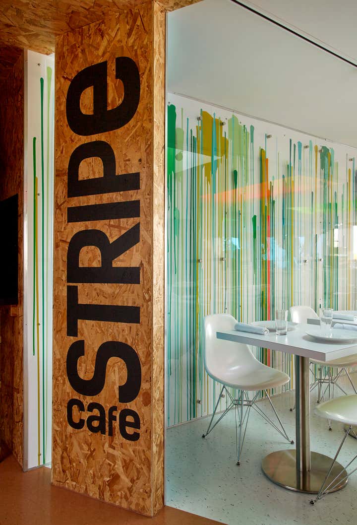 Particle board walls and ceiling - Stripe Cafe designed by Doug Meyer