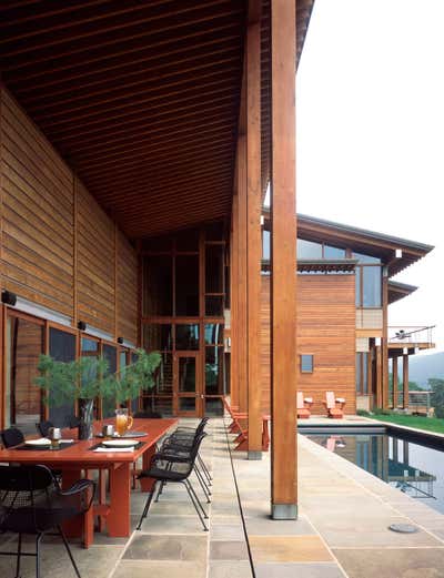 Contemporary Patio and Deck. Blue Mountains, Pennsylvania by Stephen Shadley Designs.