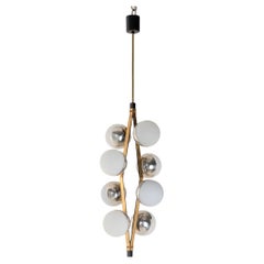 Prod. Stilnovo, Italia, 1960 lampadario a sospensione in ottone cromato.