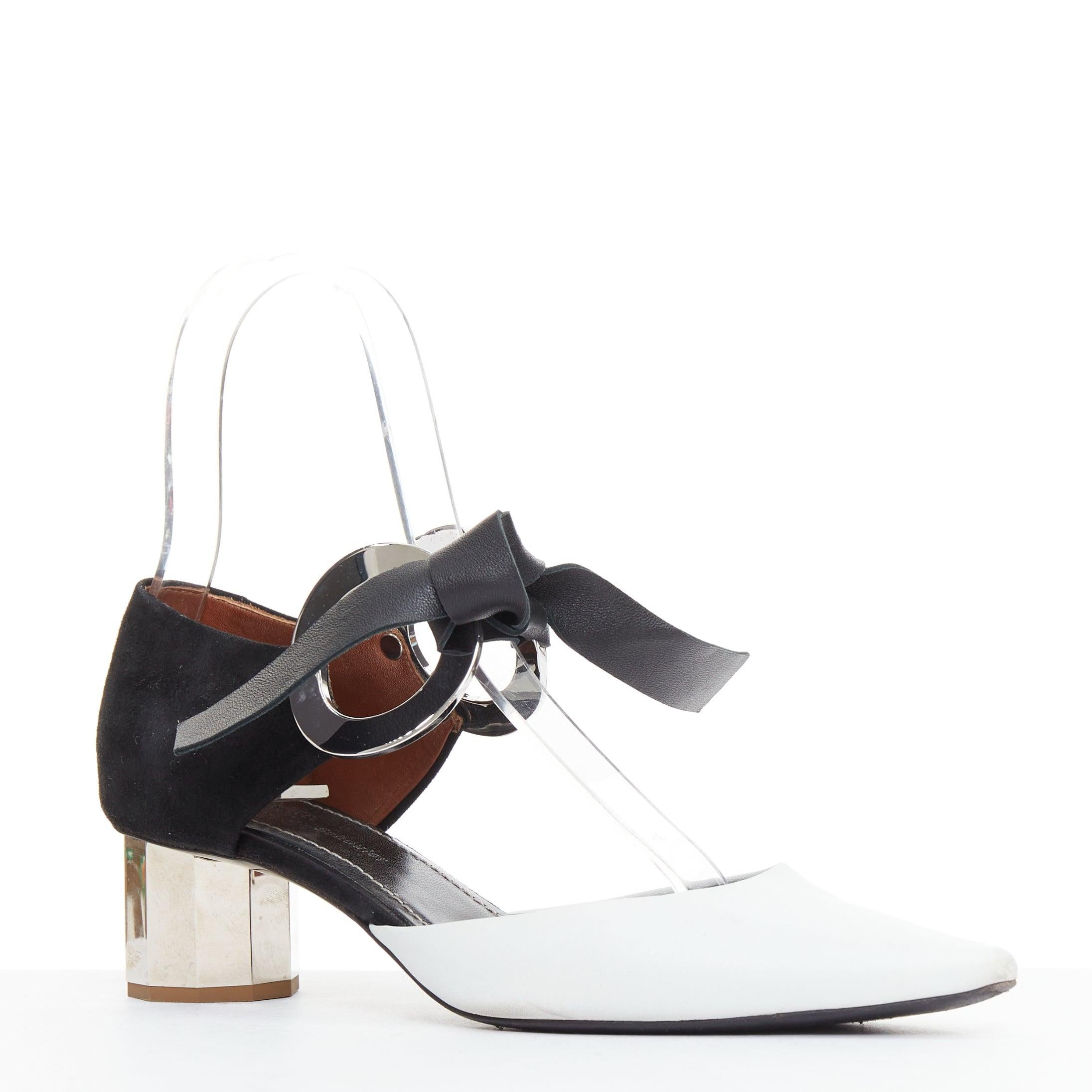PROENZA SCHOULER 2016 bicolor negro blanco ojal metal tacones EU36
Referencia: KYCG/A00204
Marca: Proenza Schouler
Colección: 2016
Material: Cuero, metal
Color: Negro, Blanco
Patrón: Sólido
Cierre: Self Tie
Forro: Piel negra
Detalles adicionales: