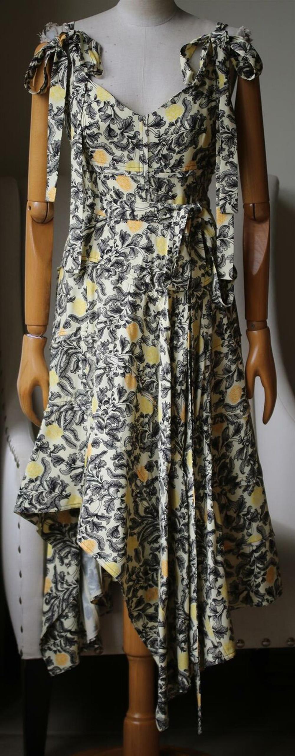 Printed with monochrome leaves and blooms that look as though they've been drawn by hand, this georgette midi dress falls to an asymmetric hem and has tie-fastening shoulder straps so you can adjust the fit. Multicolored georgette. Concealed zip