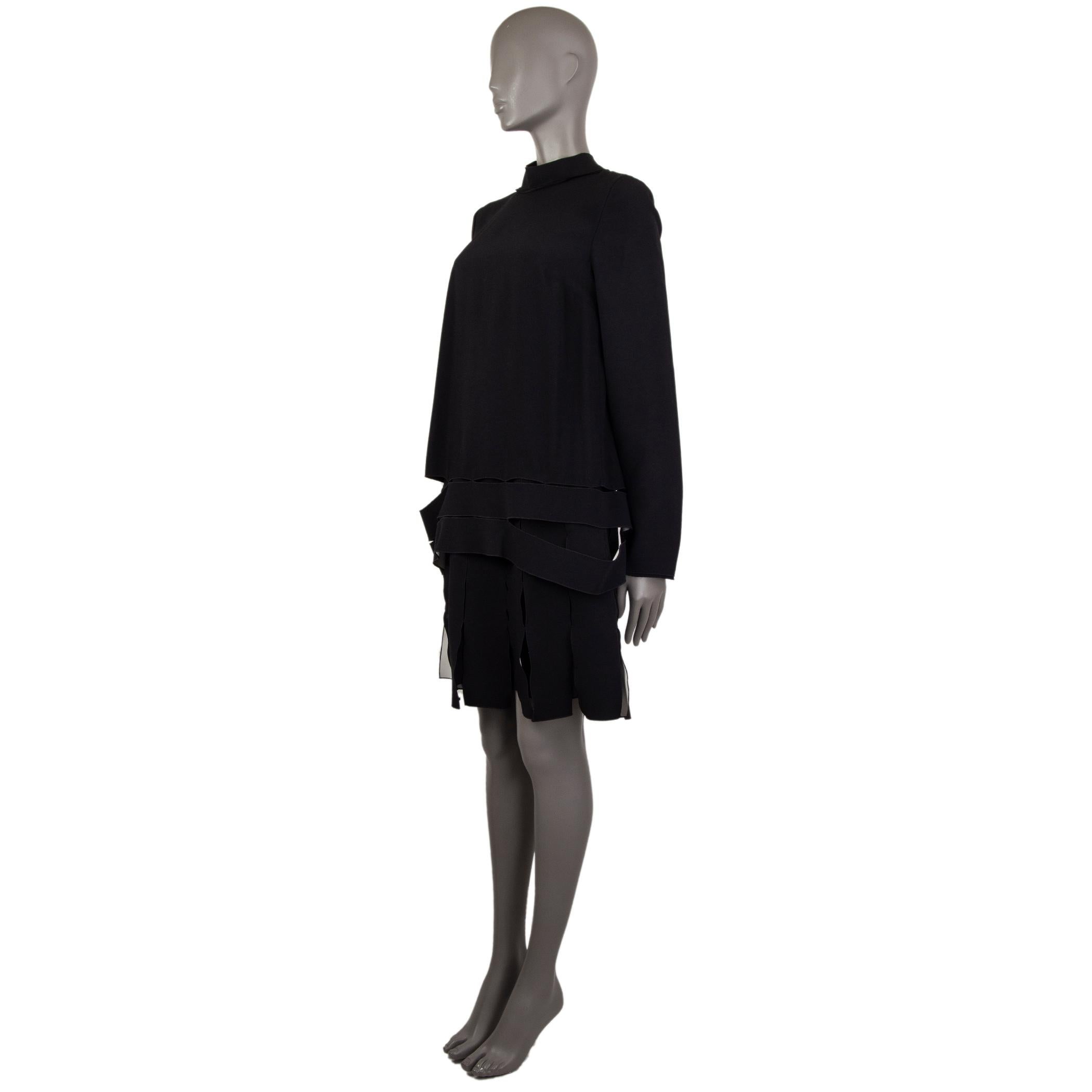 100% authentic Proenza Schouler tiered long-sleeve dress in black acetate (74%) and viscose (26%). With slit back, cut-out hemline, and cut-out skirt. Ties with ribbon behind the neck and closes with invisible zipper on the side. Lined in black silk