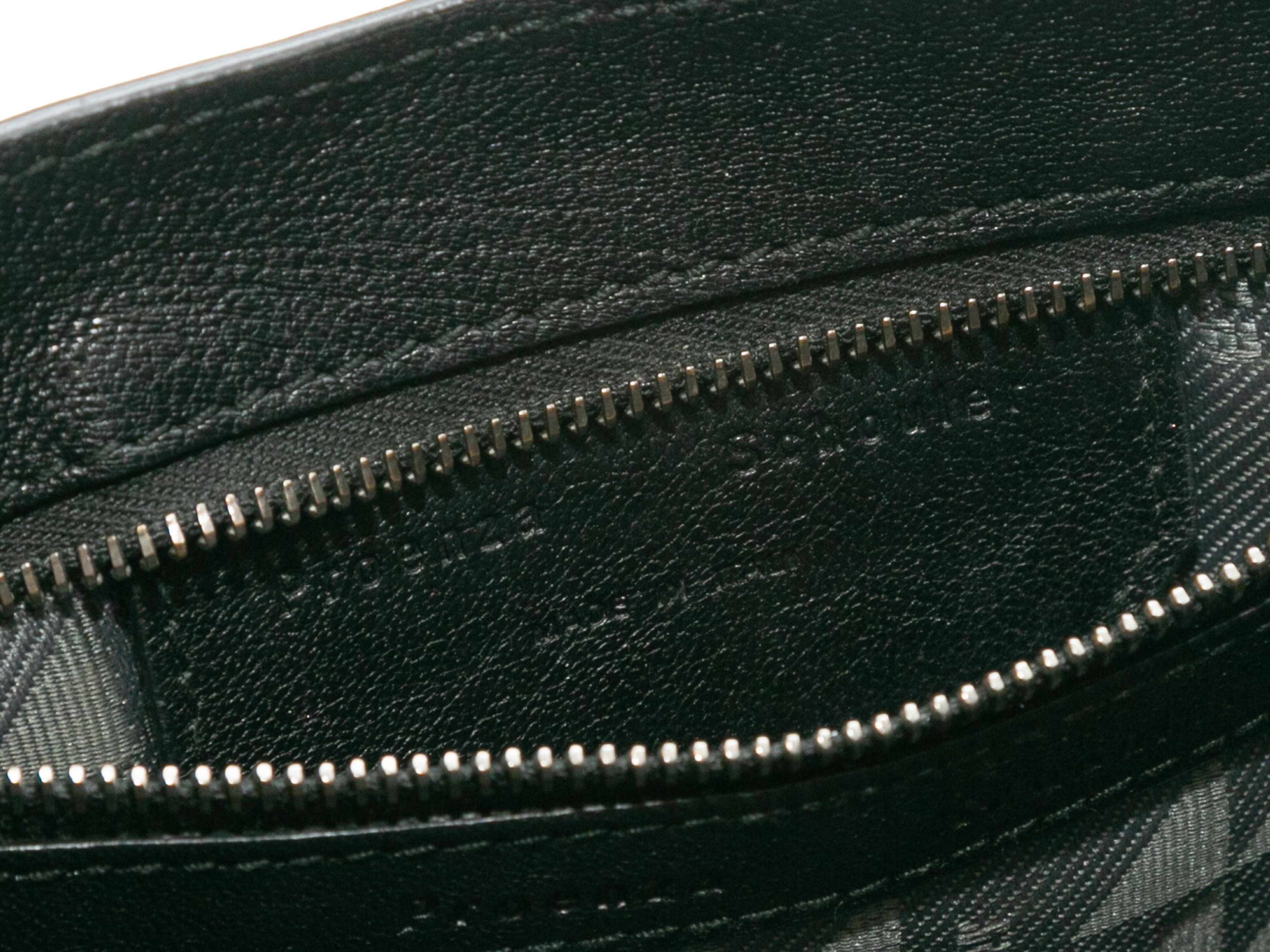 Product Details: Black Proenza Schouler PS1 Crossbody Bag. This bag features a leather body, silver-tone hardware, a single flat shoulder strap, and front clasp closure. 8
