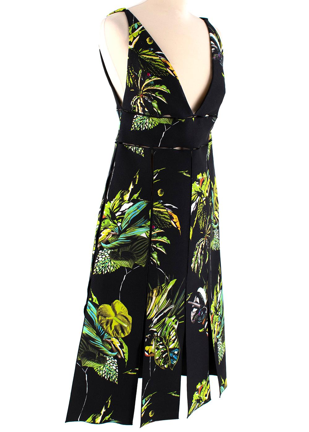 Proenza Schouler Black Tropical Print Cut-Out Dress

- Stunning, vibrant tropical print
- Gorgeous cutout detail throughout
- Concealed zipper enclosure down side
- Mid-weight fabric
- Fit-and-Flare silhouette
- Front and back v-neckline

Materials: