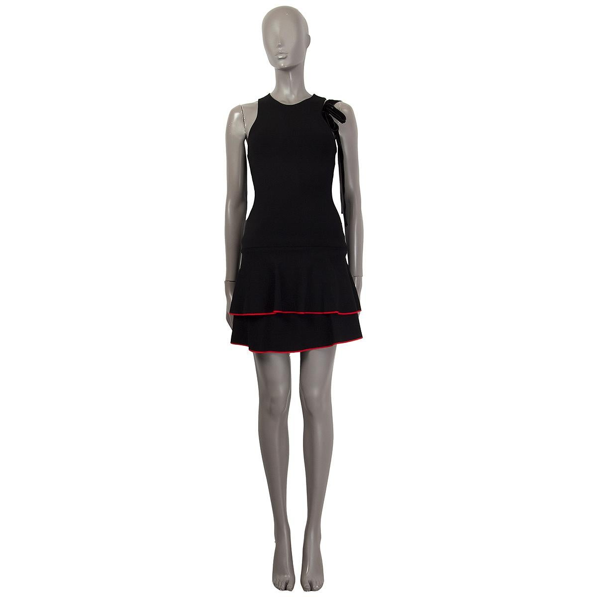 100% authentic Proenza Schouler sleeveless fit-to-flare dress in black viscose (75%) and polyamide (25%) with a round neck and red trimming details. Comes with a black detachable velvet bow detail. Unlined. Has been worn and is in excellent