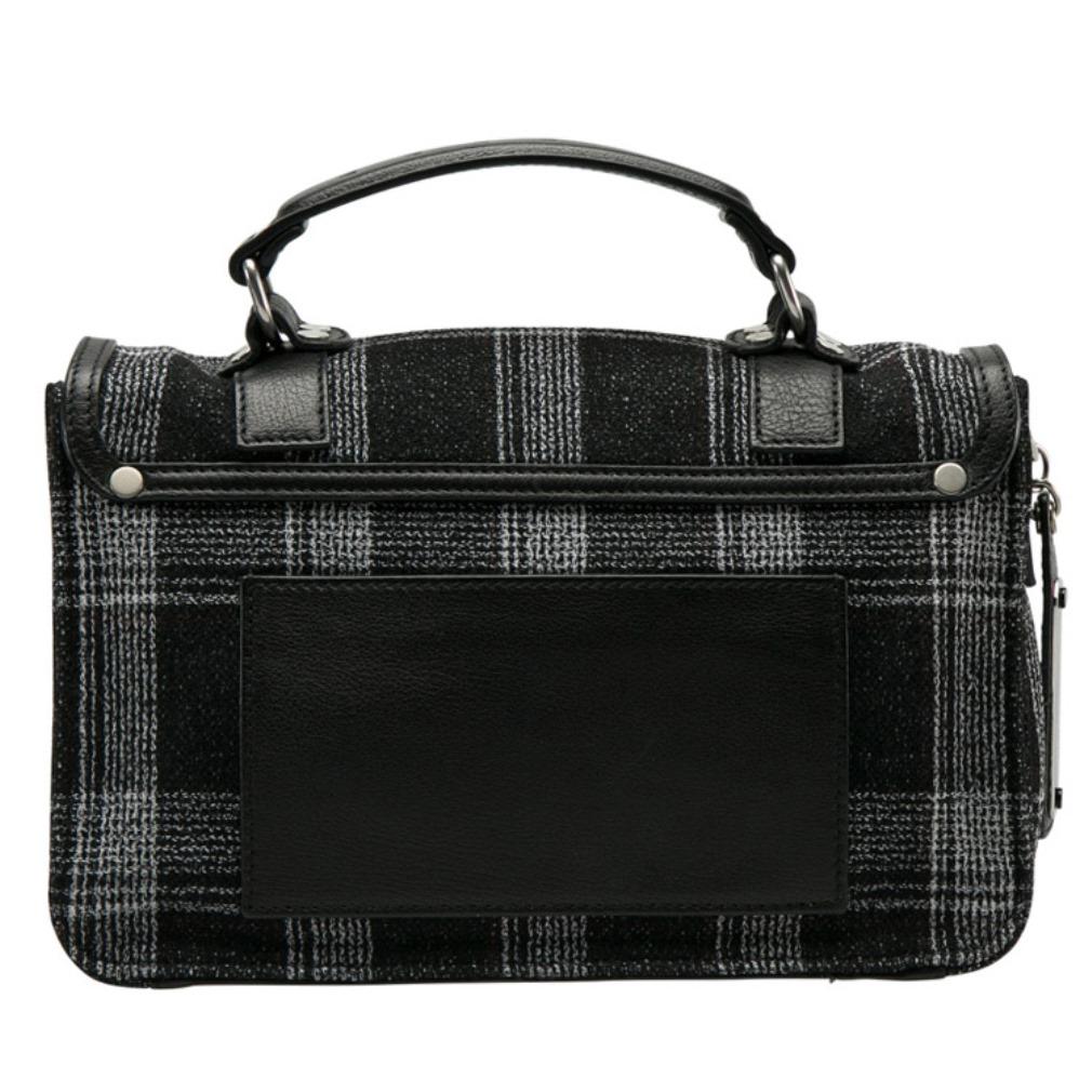 Proenza Schouler was founded in 2002 and is famous for contemporary yet modern designs. Look like a diva when you are swinging this PS1 beauty that has been meticulously crafted from fabric and leather. The bag features a removable shoulder strap, a