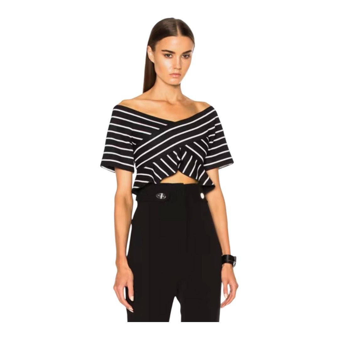 Proenza Schouler Black & White Off-Shoulder Knit Top

Make a bold statement with this sculptural striped knit top from Proenza Schouler. Featuring a modern off-the-shoulder neckline, asymmetrical stripe patterning, and architectural peplum detail,