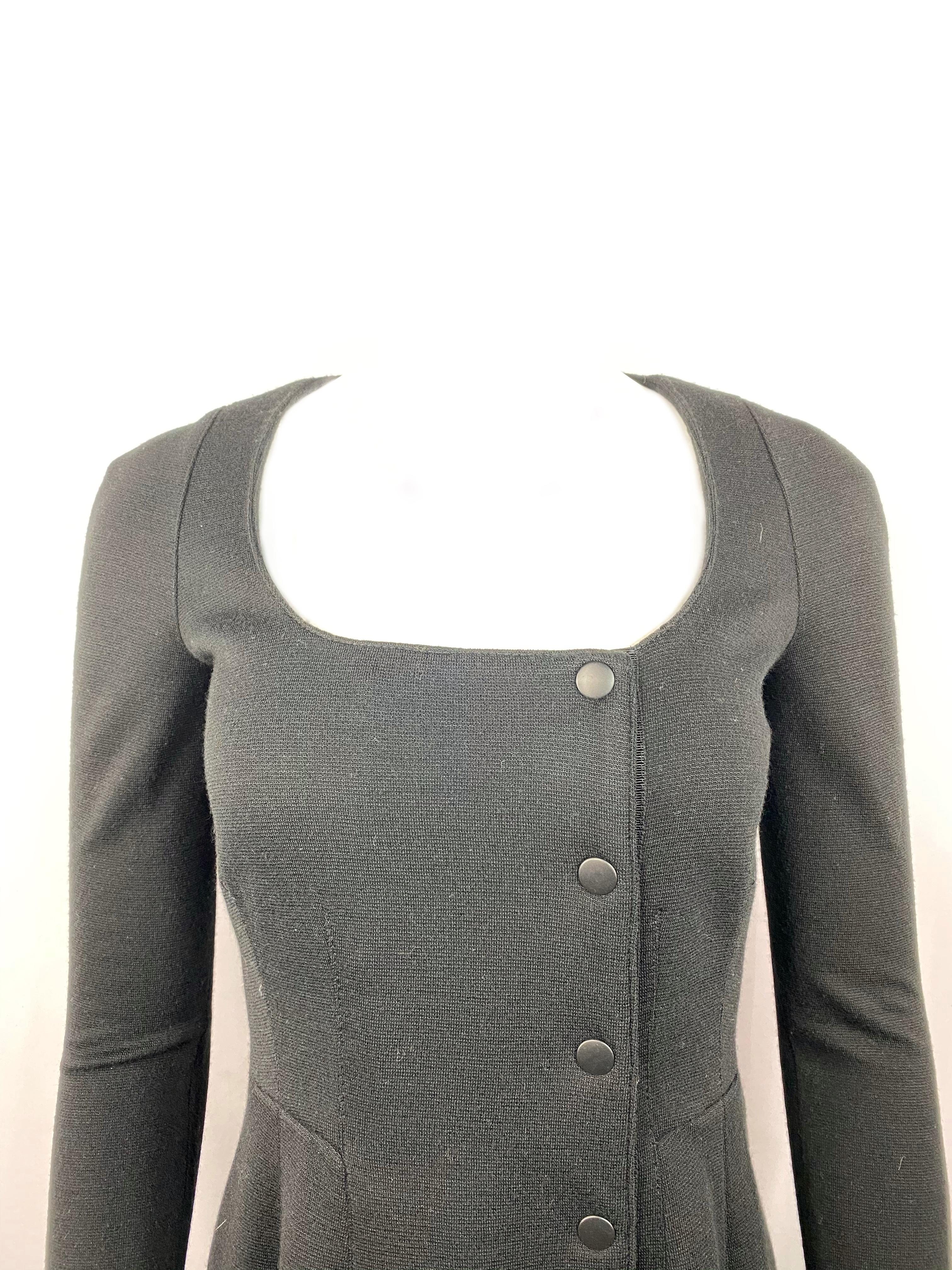 Proenza Schouler Black Wool Mini Dress w/ Buttons Size 4

Product details:
Size 4
100% wool
Long sleeves
Mini length 
Featuring eight front buttons closure and four buttons on the bottom of each sleeve
Made in Italy
