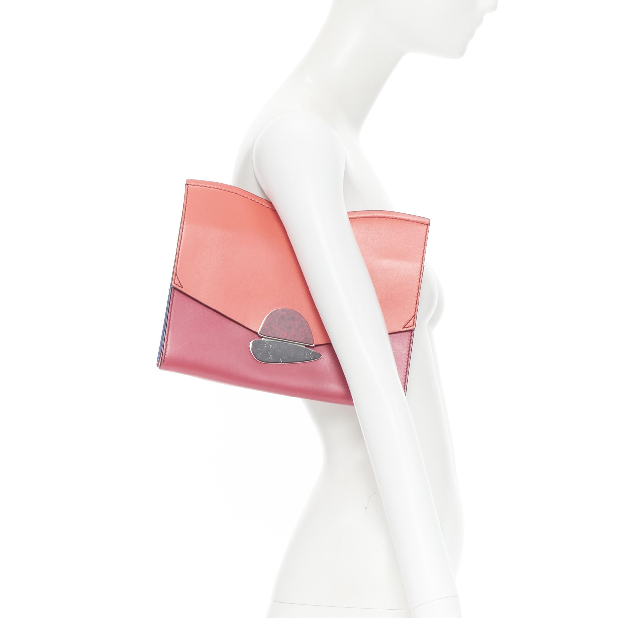 PROENZA SCHOULER coral red leather marble stone flap wavy topline clutch bag 
Reference: TALI/A00001 
Brand: Proenza Schouler 
Designer: Proenza Schouler 
Model: Stone pebble clutch 
Material: Leather 
Color: Red 
Pattern: Solid 
Closure: Magnet