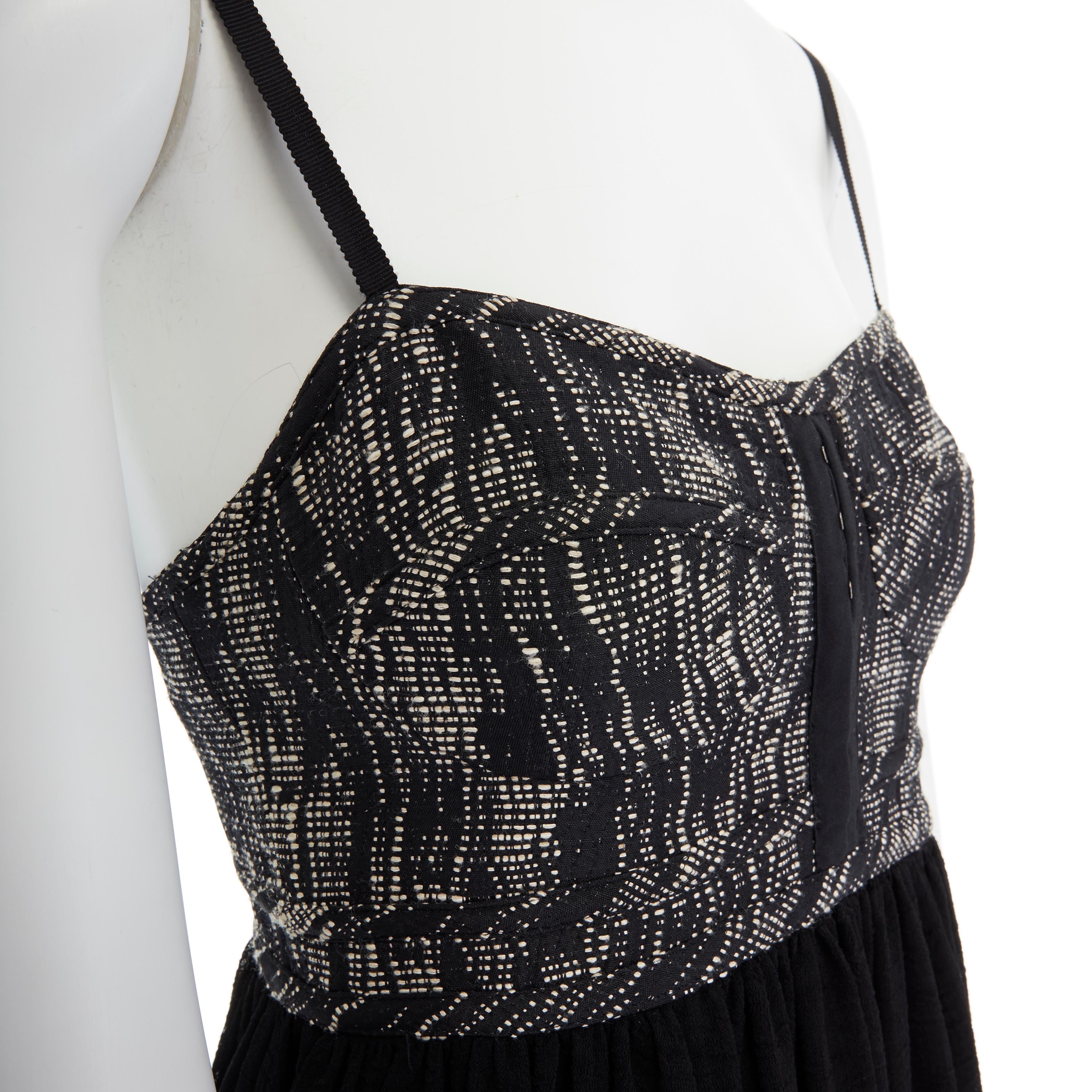 PROENZA SCHOULER grey tweed bust silk flounce skirt mini dress XS FR34 US2 UK6
Reference: TGAS/A00066
Brand: Proenza Schouler
Material: Triacetate
Color: Grey, Black
Pattern: Solid
Extra Details: Grey tweed at bust. Constructed bust. Sweetheart