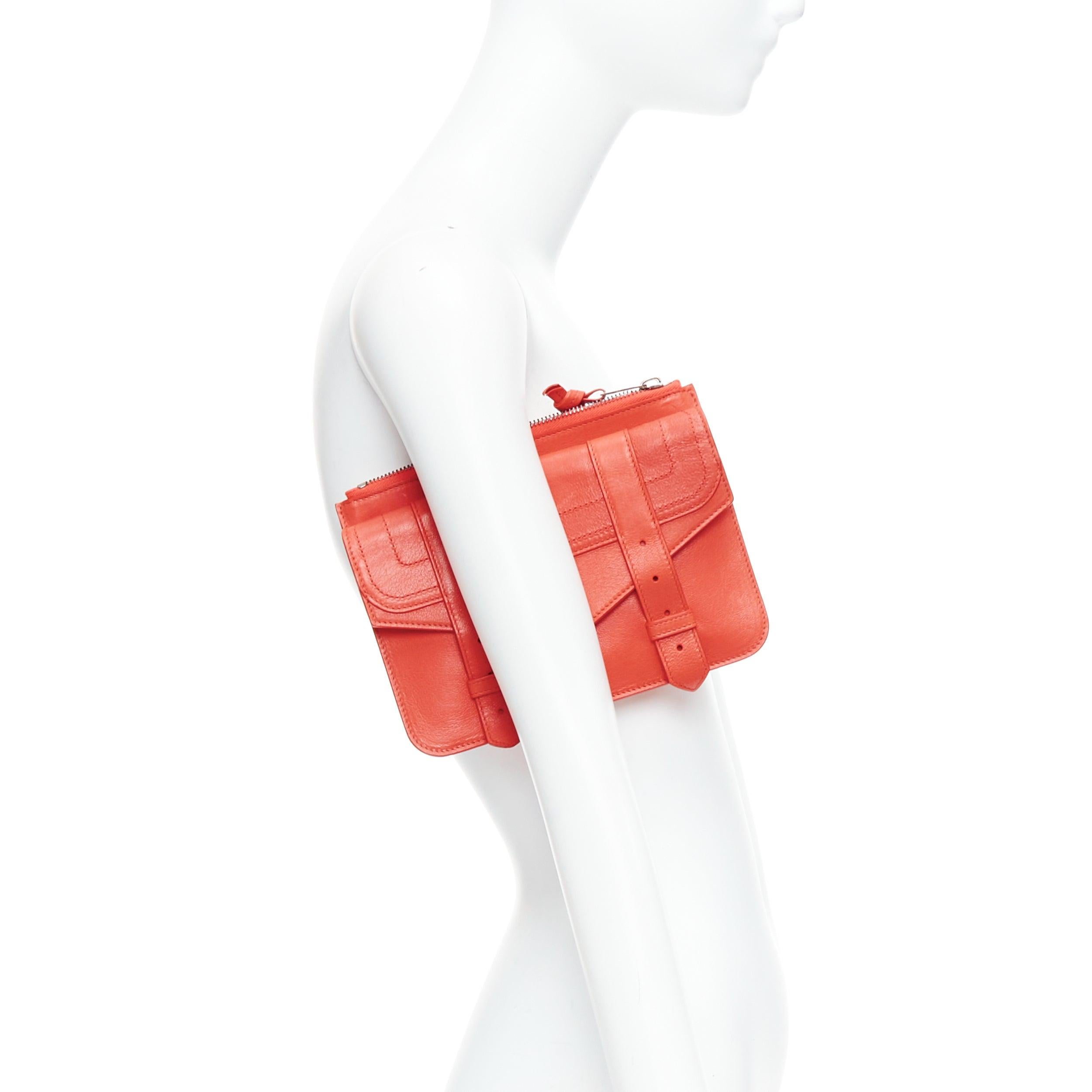PROENZA SCHOULER PS1 coral red zip envelop portfolio clutch pouch
Reference: CELE/A00034
Brand: Proenza Schouler
Model: PS1
Material: Leather
Color: Red
Pattern: Solid
Closure: Zip
Lining: Grey Fabric

CONDITION:
Condition: Very good, this item was