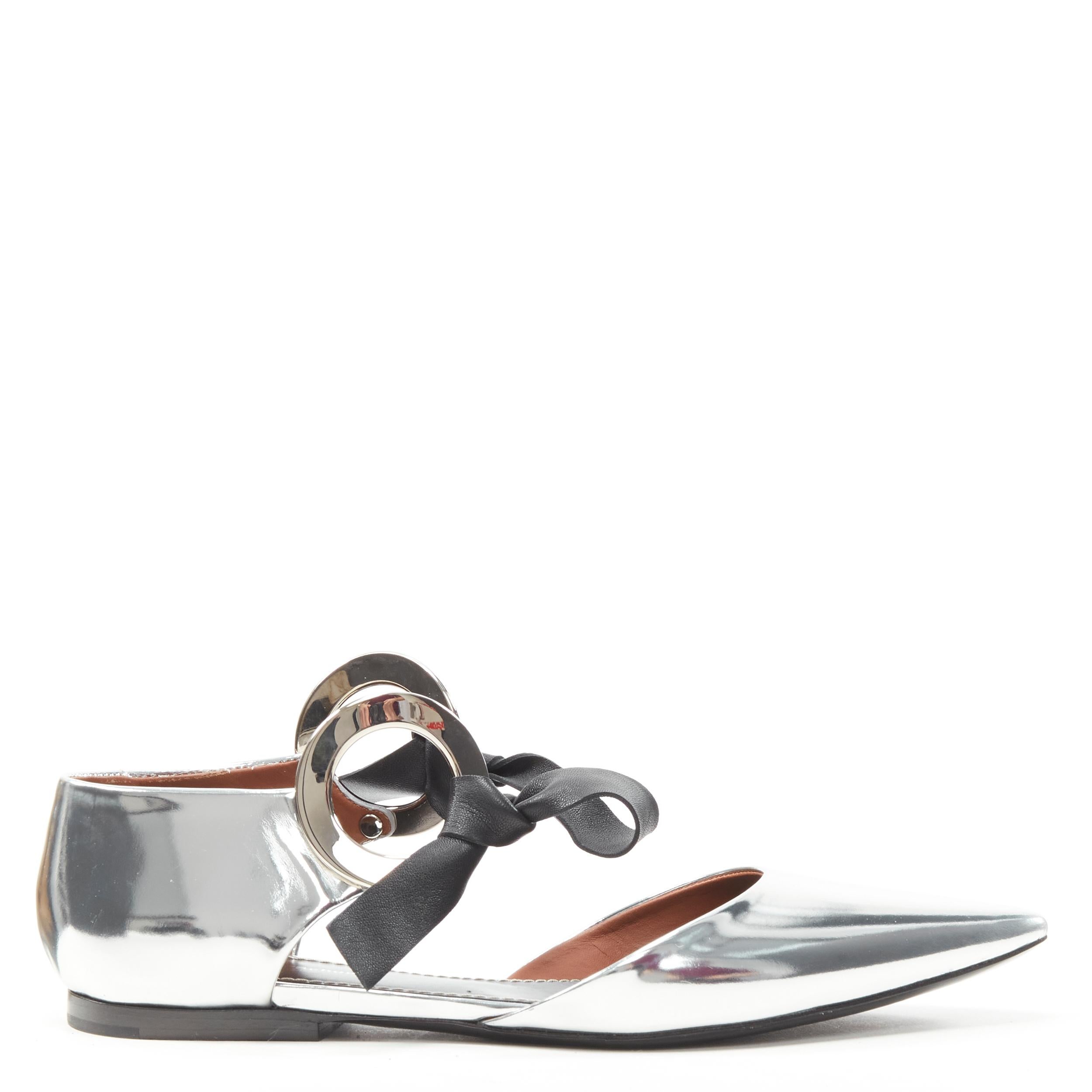 PROENZA SCHOULER PS30135 metallic silver leather loop tie flats EU37.5 US7.5 
Reference: MELK/A00210 
Brand: Proenza Schouler 
Model: PS30135 
Material: Leather 
Color: Silver 
Pattern: Solid 
Closure: Leather tie 
Extra Detail: Black leather bow