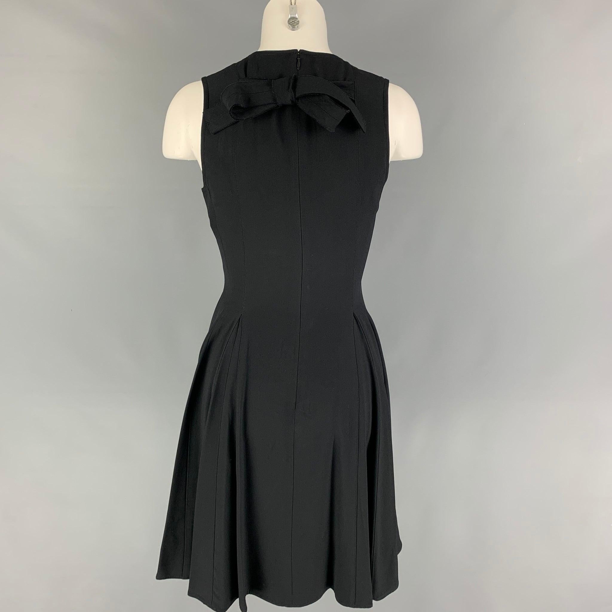 PROENZA SCHOULER dress comes in a black acetate / viscose featuring a a-line style, pleated, sleeveless, back self-tie strap, and a back zip up closure.
New with tags.
 

Marked:  2 

Measurements: 
 
Shoulder: 12 inches Bust: 31 inches Waist: 27
