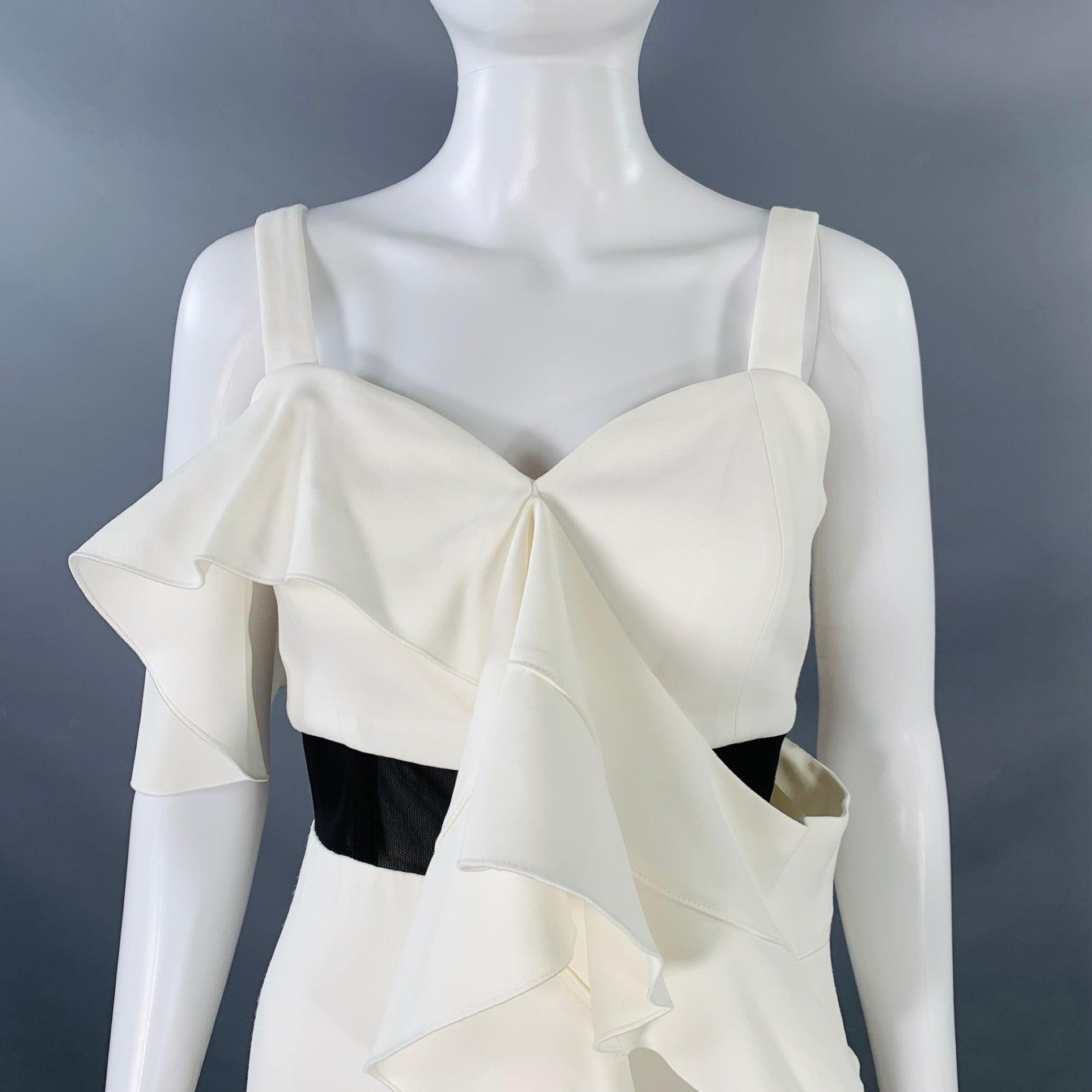 PROENZA SCHOULER cocktail dress
in a cream viscose stretch blend featuring a ruffle skirt, black mesh 