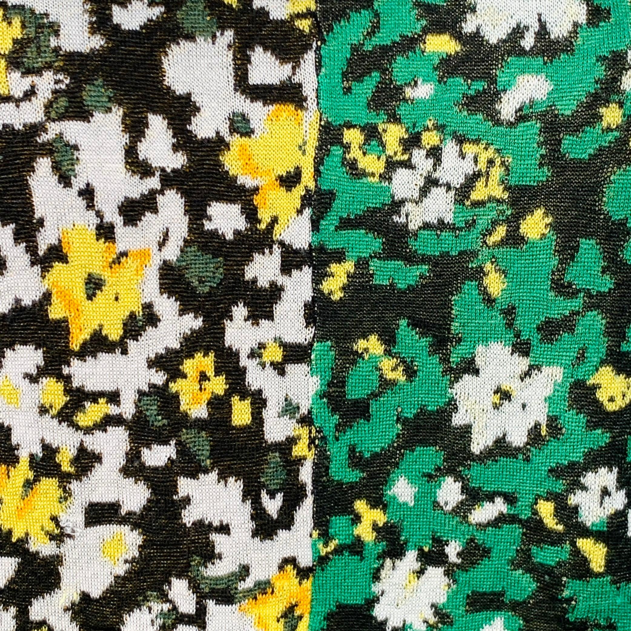PROENZA SCHOULER pullover
in a black, green, and white silk knit featuring a color block floral design, long sleeves, and crew neck.Very Good Pre-Owned Condition. Minor snagging. 

Marked:   M 

Measurements: 
 
Shoulder: 16.25 inches Bust: 40