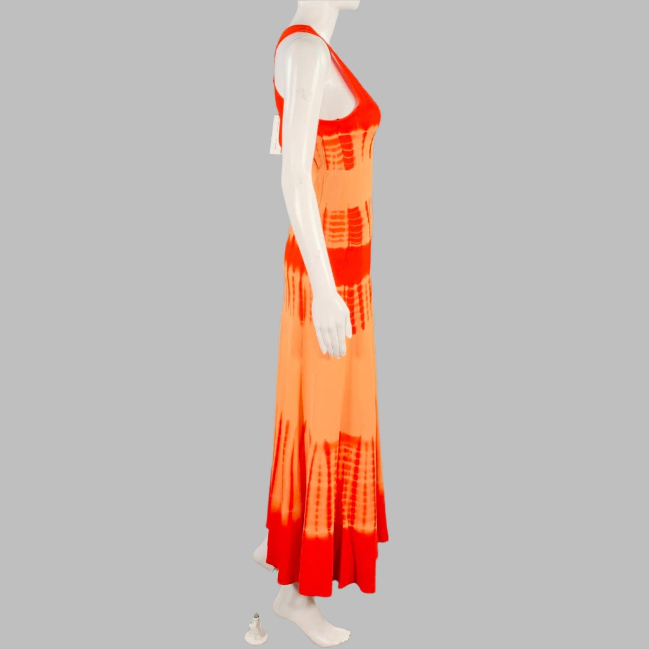 PROENZA SCHOULER dress
in an orange viscose featuring a tie dye design, sleeveless style with cross back, and maxi length.New with Tags. 

Marked:   S 

Measurements: 
 
Shoulder: 12.5 inches Bust: 32 inches Waist: 30 inches Hip: 35 inches Length: