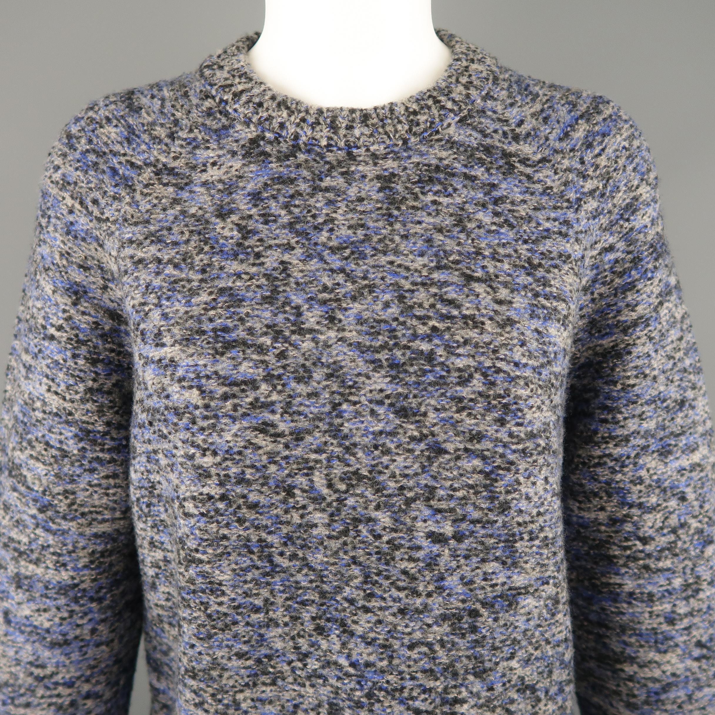 PROENZA SCHOULER pullover sweater comes in a blue and gray marbled effect heather knit with a structured oversized silhouette, ribbed crewneck and curved hem.
 
Excellent Pre-Owned Condition.
Marked: XS
 
Measurements:
 
Shoulder: 16 in.
Bust: 40