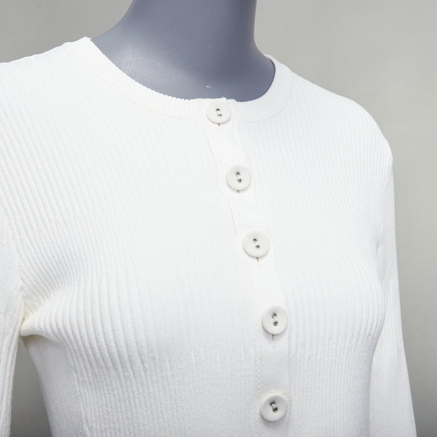 PROENZA SCHOULER white fabric button ribbed fringe trim cardigan M
Reference: CNPG/A00076
Brand: Proenza Schouler
Material: Viscose, Blend
Color: White
Pattern: Solid
Closure: Button
Extra Details: Body contour ribbed knit.
Made in: