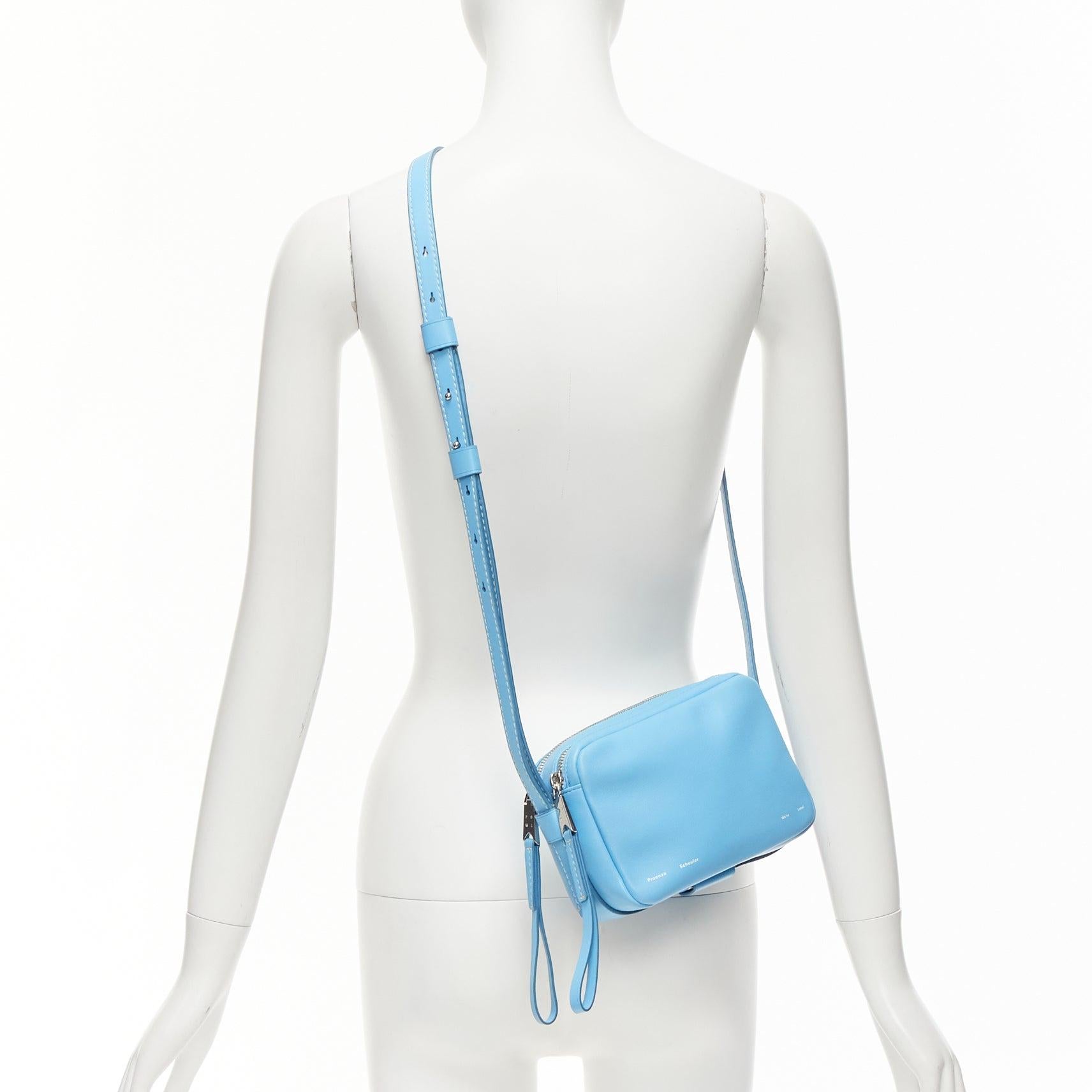 PROENZA SCHOULER White Label blue leather silver zipper logo crossbody camera bag
Reference: KYCG/A00030
Brand: Proenza Schouler
Collection: White Label
Material: Leather
Color: Blue
Pattern: Solid
Closure: Zip
Lining: Black