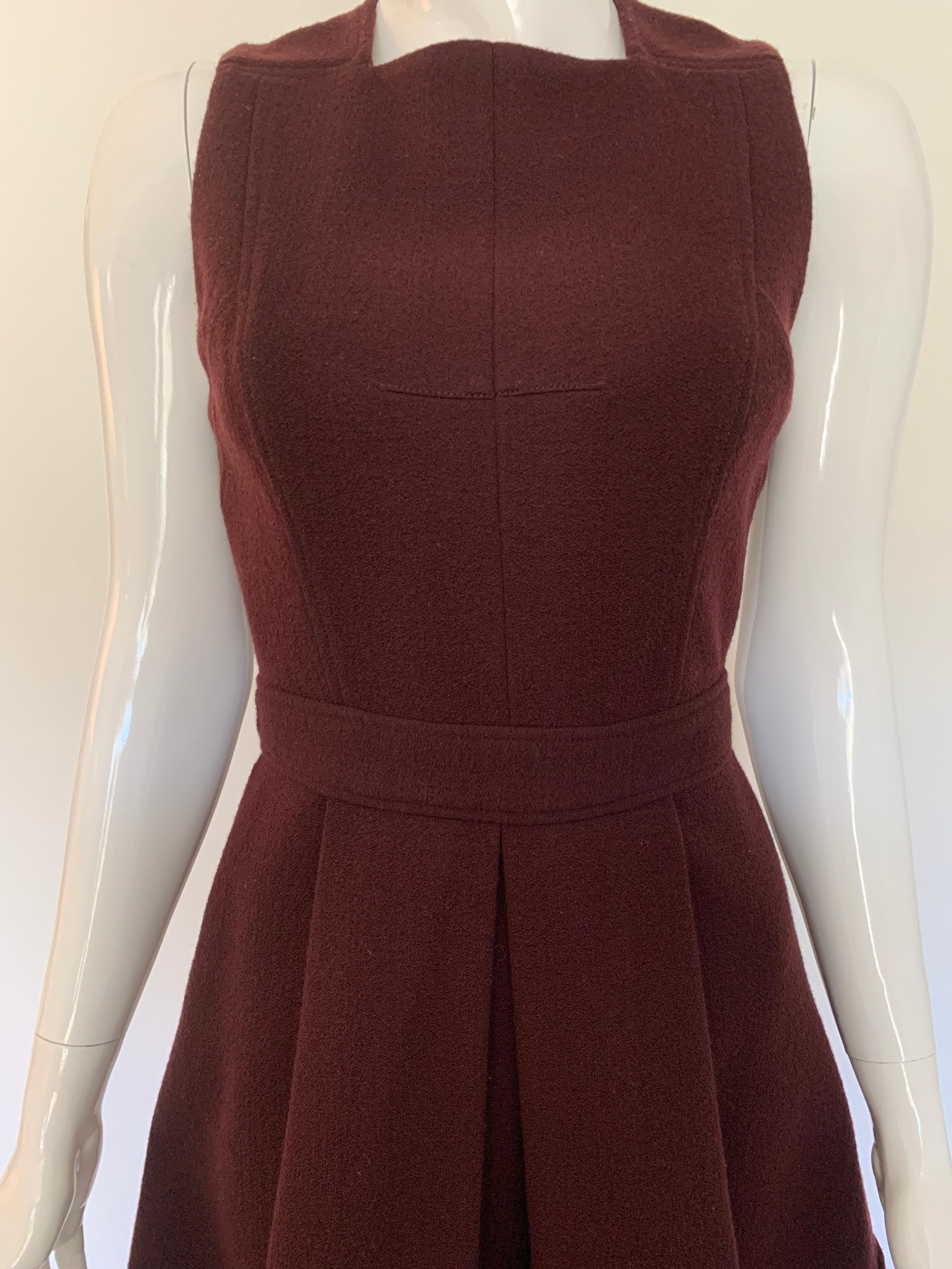 Proenza Shouler Aubergine Dress. 
Classic in style, with a fitted waist and flared skirt. Sleeveless with square neck.

Size 4. 

Great condition, no sign of wear.  