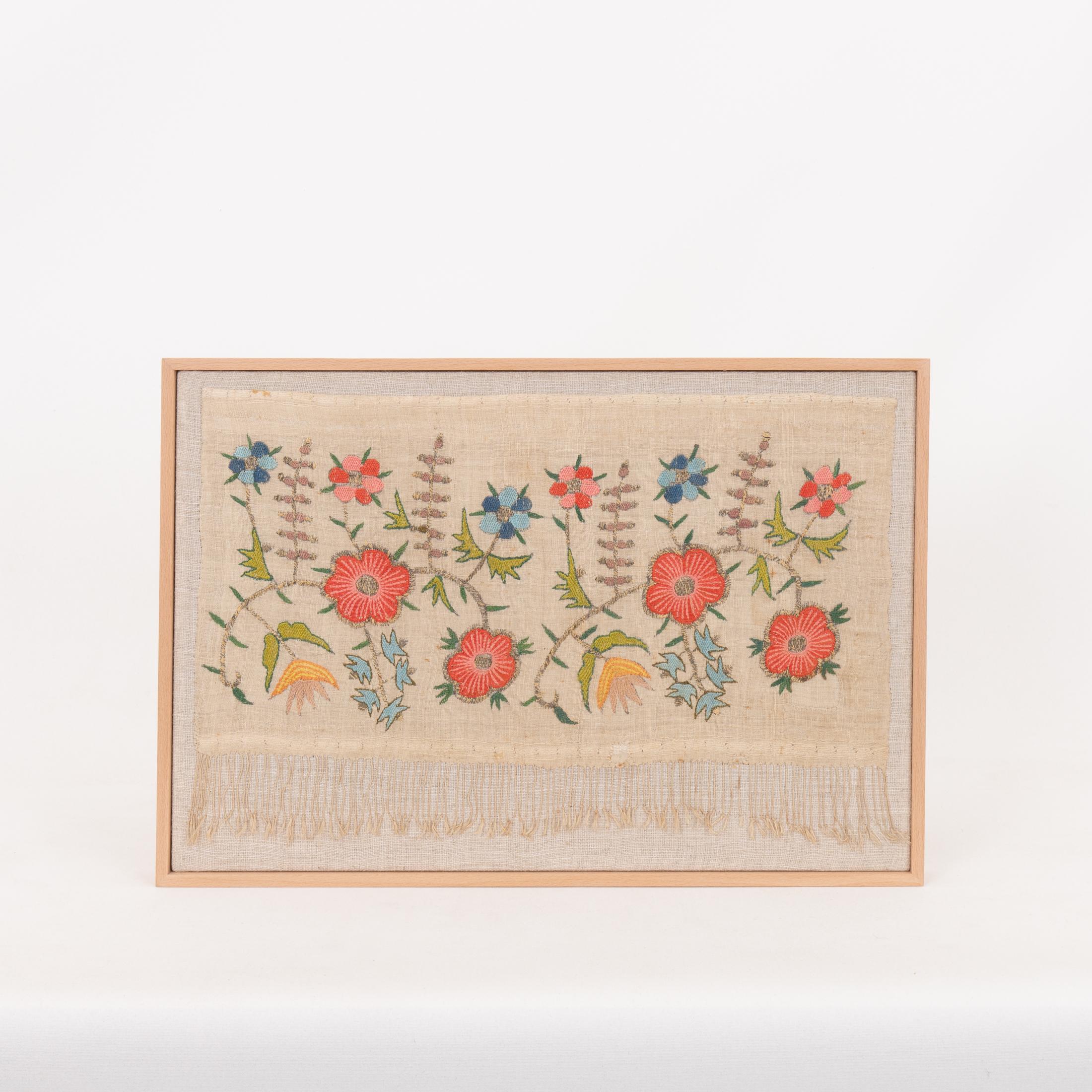 First the fragment has been hand backed on a linen fabric, then stretched over a wooden stretcher and finished with a wooden frame.
Late 19th C. Turkey
Ready to go on a wall.


Framed Item above is made from a used and antique embroidery therefore