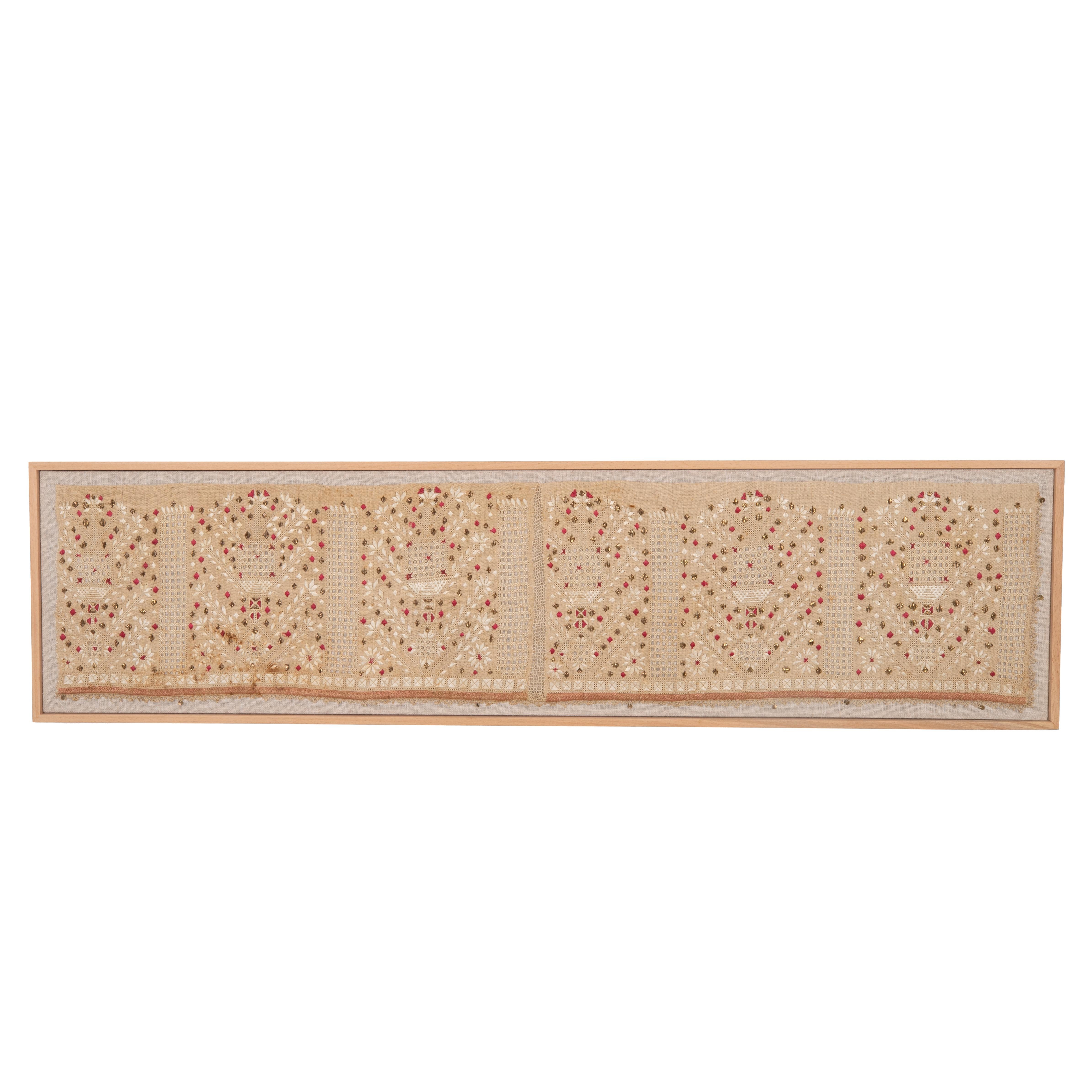 First the fragment has been hand backed on a linen fabric, then stretched over a wooden stretcher and finished with a wooden frame.
Late 19th C. Uzbekistan
Ready to go on any wall.

Framed Item above is made from a used and antique embroidery