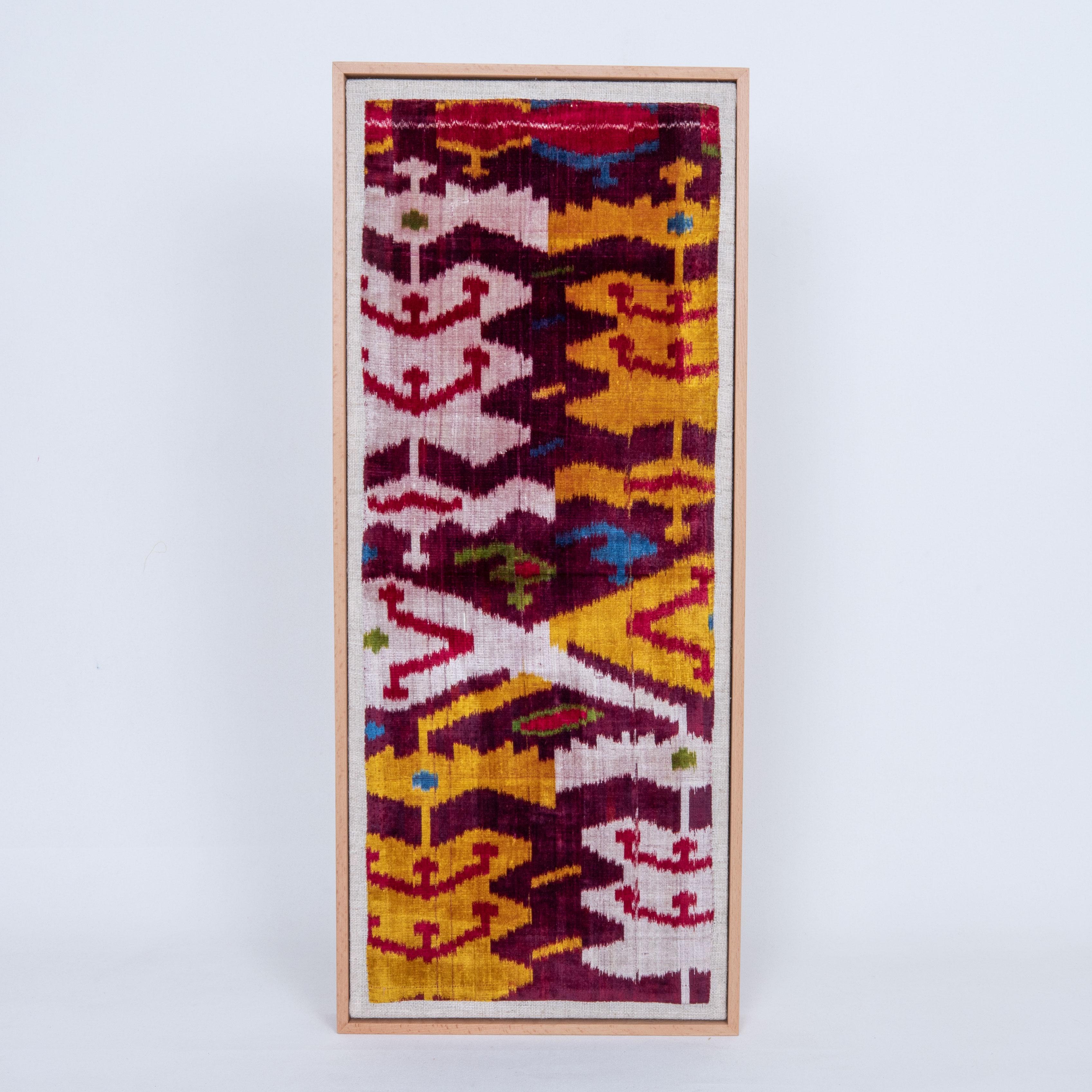 This velvet fragment has a rare design and it is probably mid 19th C or earlier.

First the fragment has been hand backed on a linen fabric, then stretched over a wooden stretcher and finished with a wooden frame.
Late 19th C. Uzbekistan.
Ready to