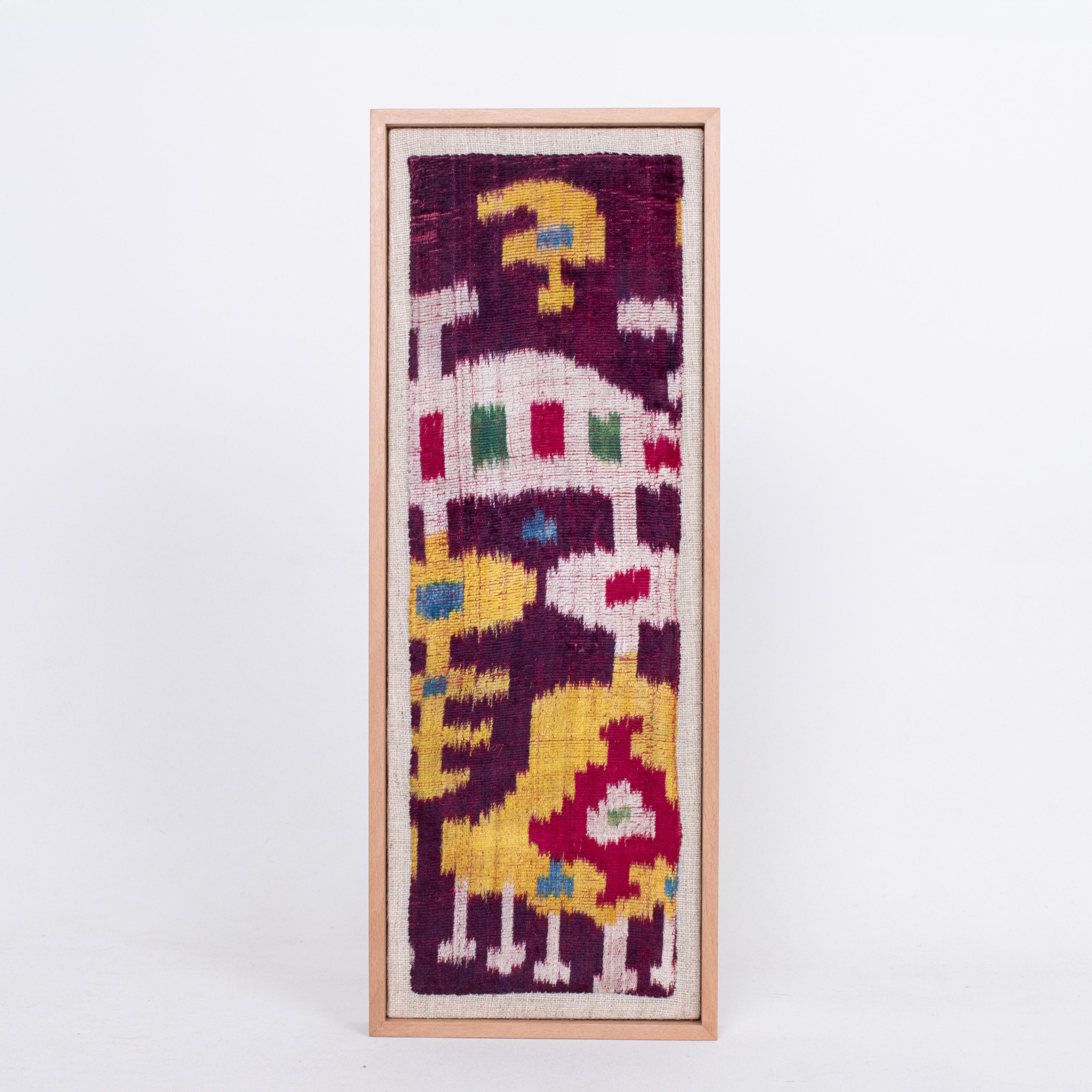 This velvet fragment has a rare design and it is probably mid 19th C or earlier.

First the fragment has been hand backed on a linen fabric, then stretched over a wooden stretcher and finished with a wooden frame.
Late 19th C. Uzbekistan.
Ready to