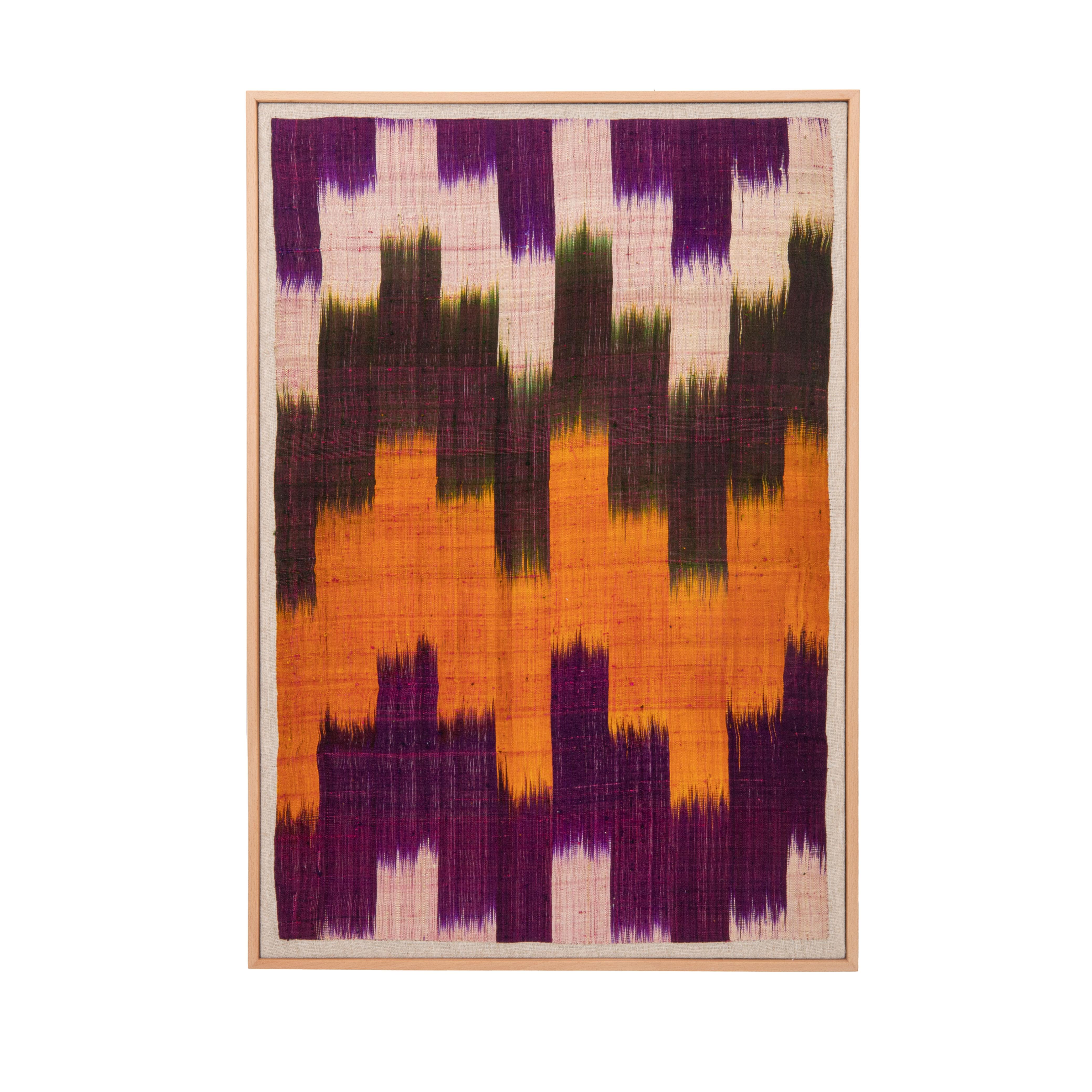 Professionally Framed Ikat Fragment, Uzbekistan, Early 20th C.
It has been hand backed on linen and stretched over a stretcher , and finished with the wooden frame.
Ready to go on any Wall.

