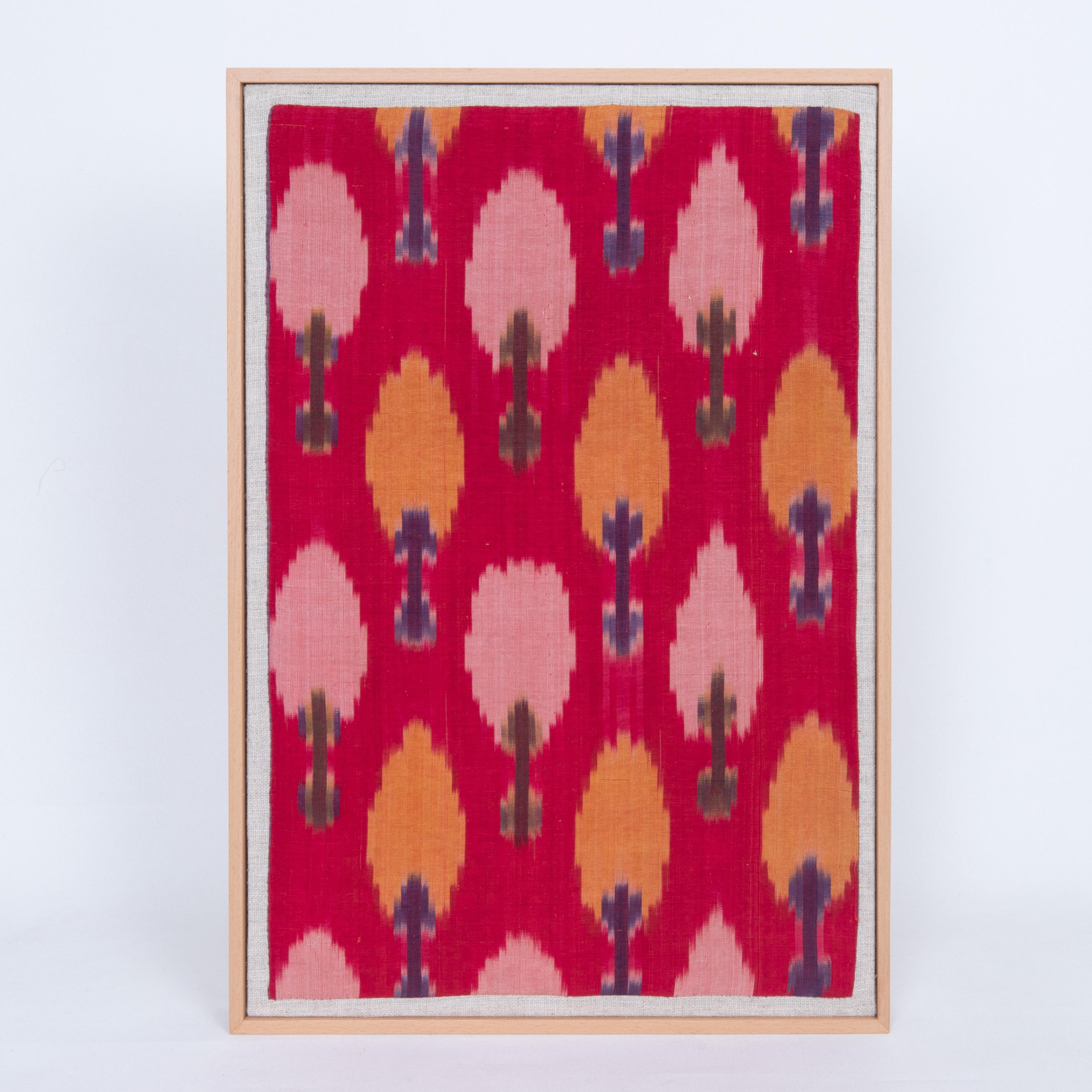 First the fragment has been hand backed on a linen fabric, then stretched over a wooden stretcher and finished with a wooden frame.
E 20th C. Uzbekistan.
Ready to go on a wall.

Framed Item above is made from a used and antique embroidery therefore