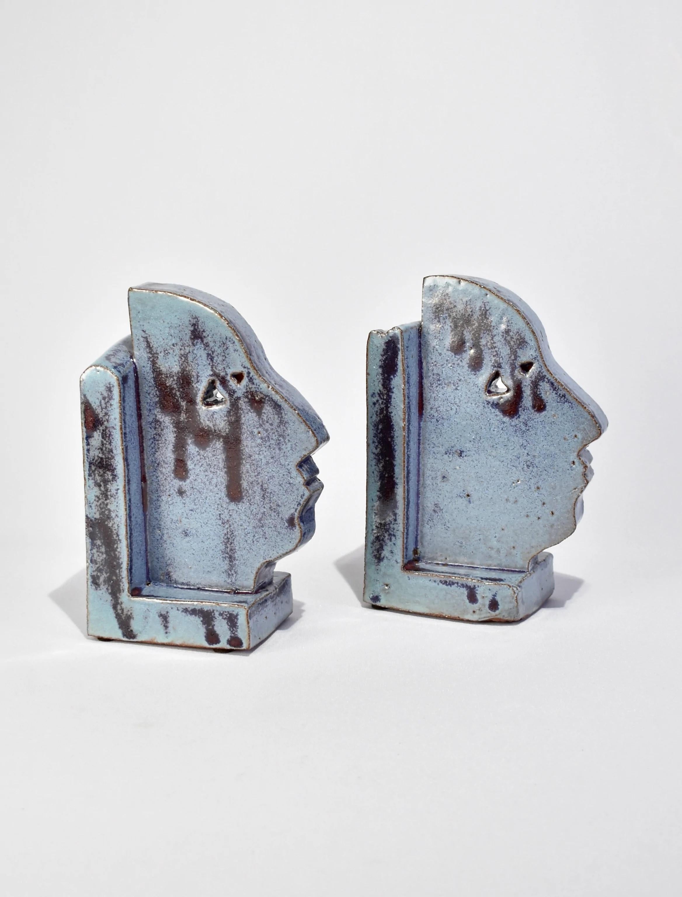 Handmade slab-built bookends with a face profile design in speckled blue, set of two. By Shane Gabier, made in NYC.

Please note that this item is handmade and therefore unique; slight variations in color and shape are to be expected.