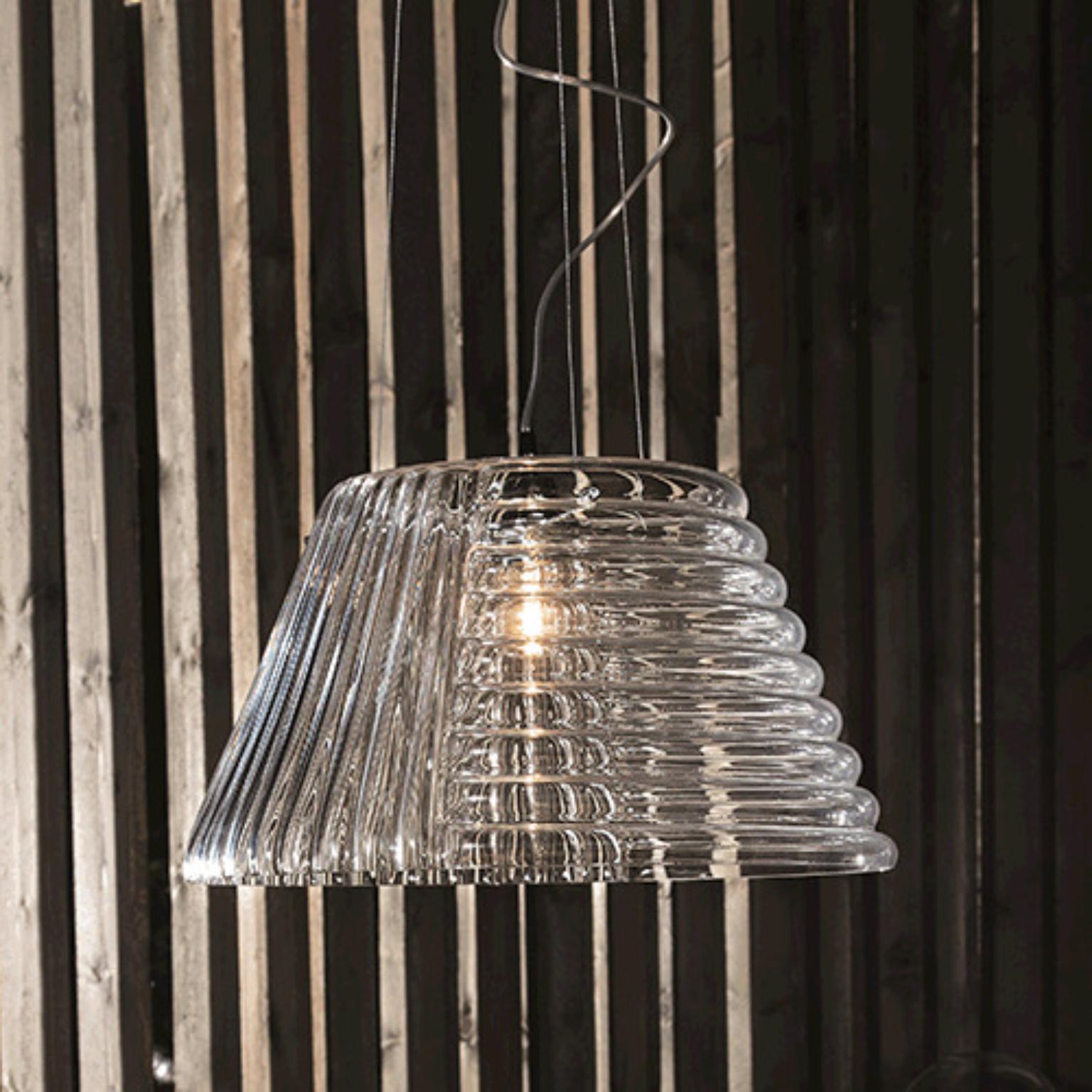 Profili PROSOMBG Pendant Lamp by Mazzega 1946
Dimensions: D 48 x H 150 cm.
Materials: Frame: Polished Chrome. 
Diffuser: Trasparent Crystal.
Weight: 006 Kg.

The roots of Mazzega1946 are in Murano, a land of master glassmakers who still today