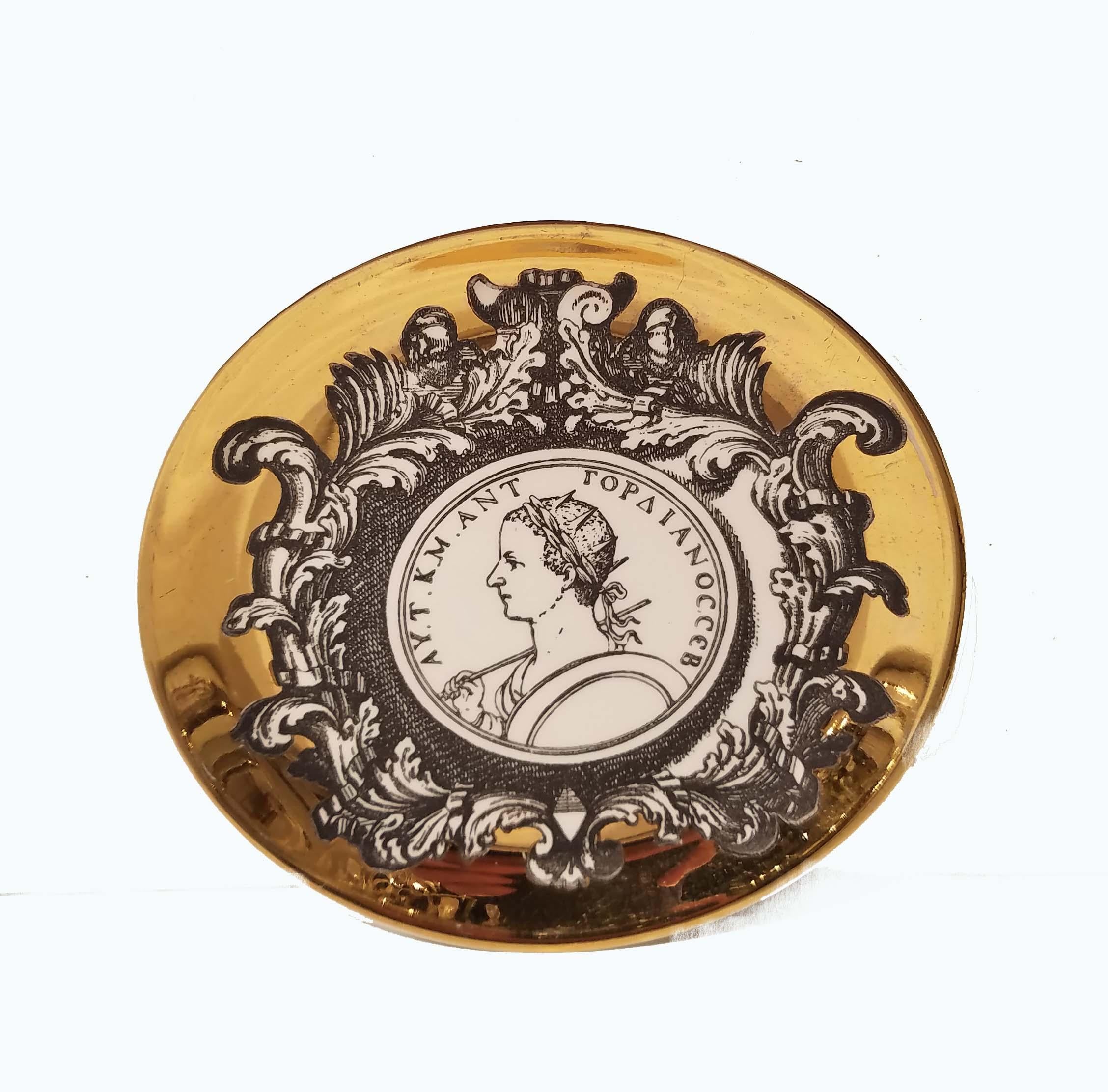 Piero Fornasetti (1913-1988)
'PROFILI ROMANI', A set of eight coasters, 1950-1960
lithographically-decorated and hand painted
Measures: 4 in. (10 cm.) diameter
with printed retailer’s label Fornasetti, Milano, made in Italy.