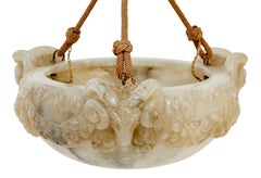 Profusely carved rams head alabaster ceiling light