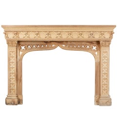 Profusely Carved Walnut and Oak Fire Surround in the Gothic Taste