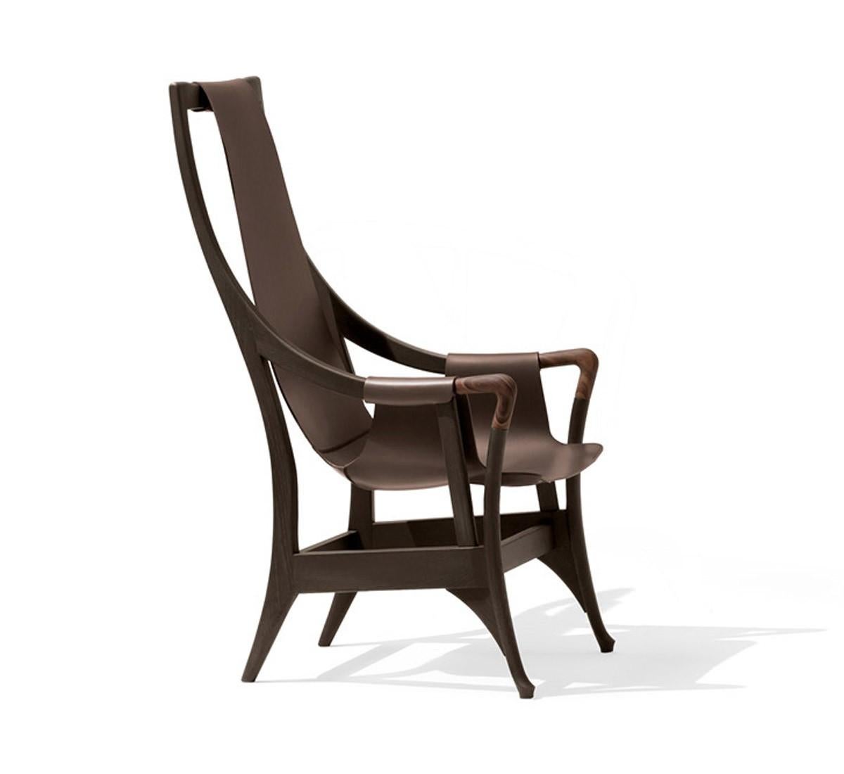 Designed in 1987, the Progetti collection was inspired by the fine detailing on an elegant handle of an antique walking stick.

Progetti 30240 armchair with the frame in solid beech wood and armrests in polished pau ferro wood. The seat and back