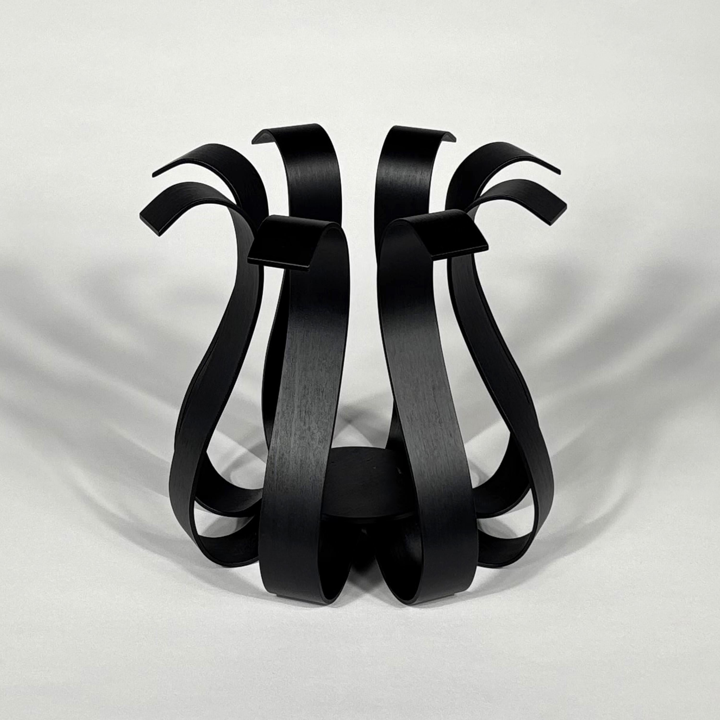 Progetto Oggetto Vase by Ola Rune 
2000 / 2002
Cappellini

Vase in beech polywood stained black for the Cappellini Progetto Oggetto Collection.